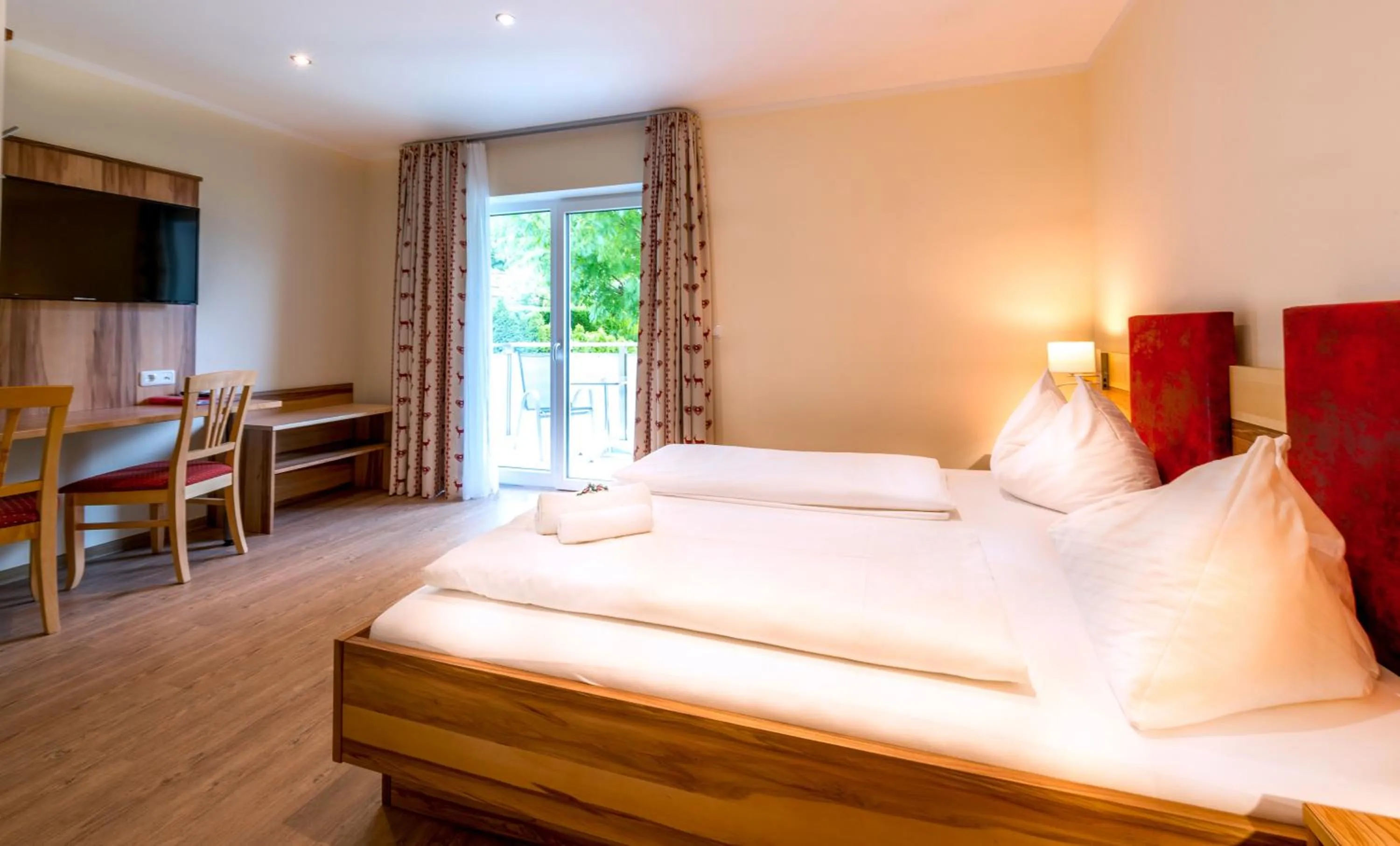 Photo of the whole room, Bed in Panorama Hotel Traunstein