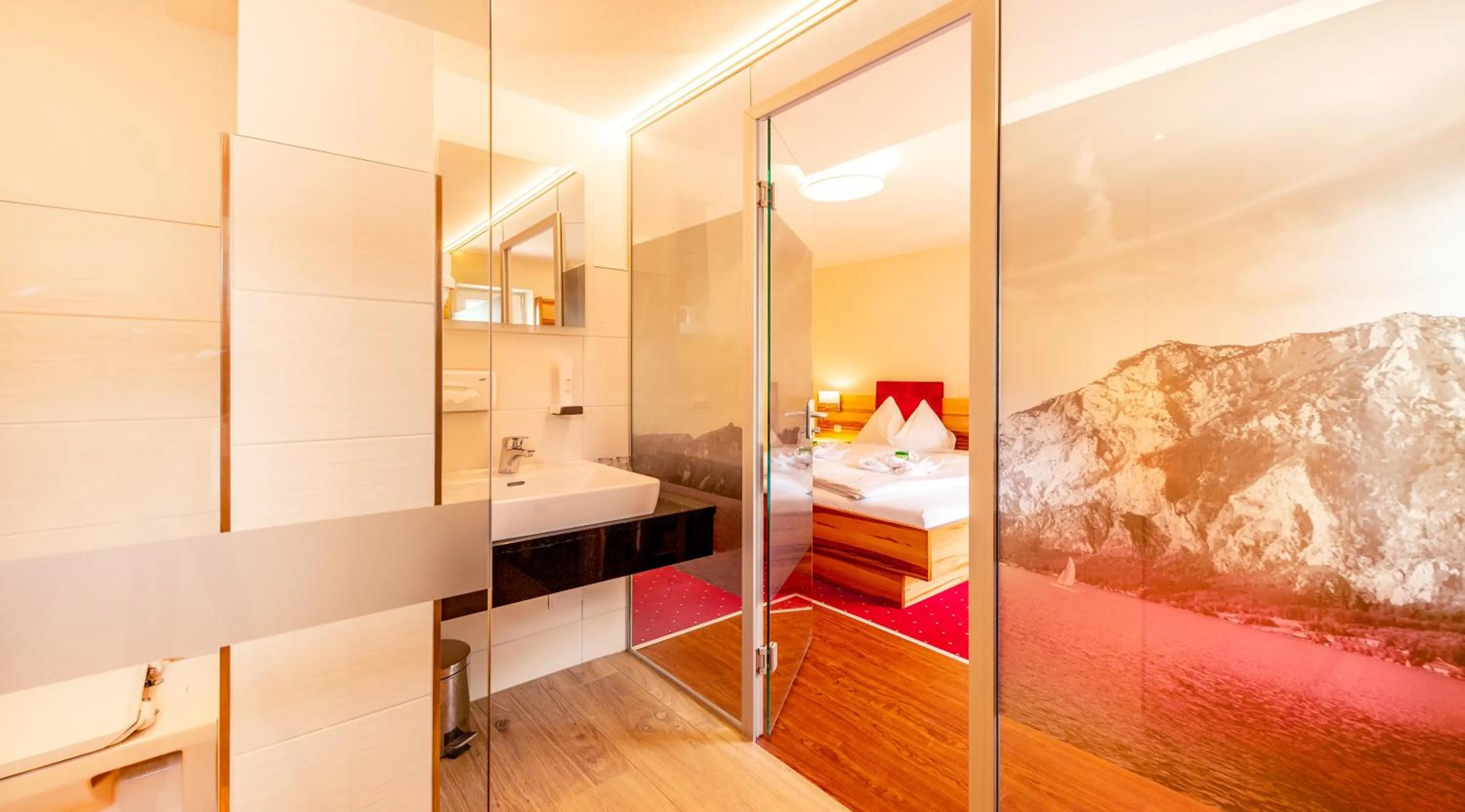 Bathroom, Bed in Panorama Hotel Traunstein