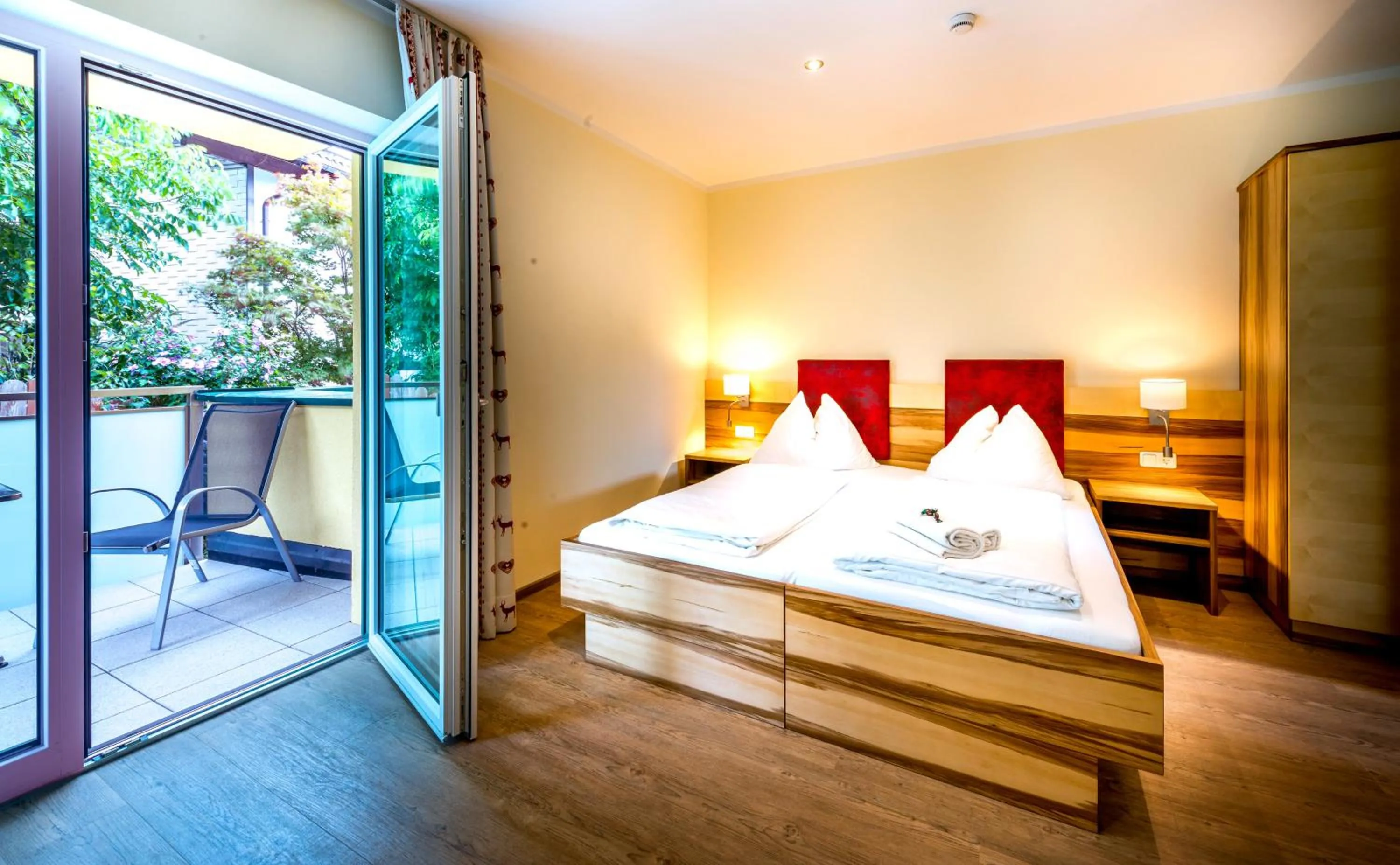 Photo of the whole room, Bed in Panorama Hotel Traunstein