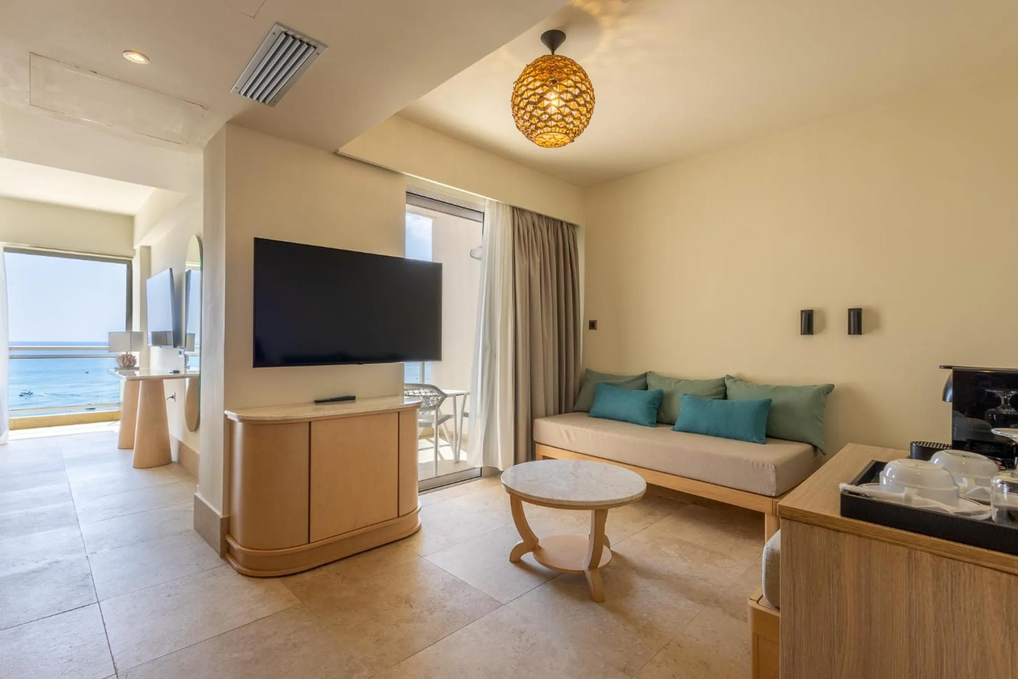 Living room in Pegasos Deluxe Beach Hotel