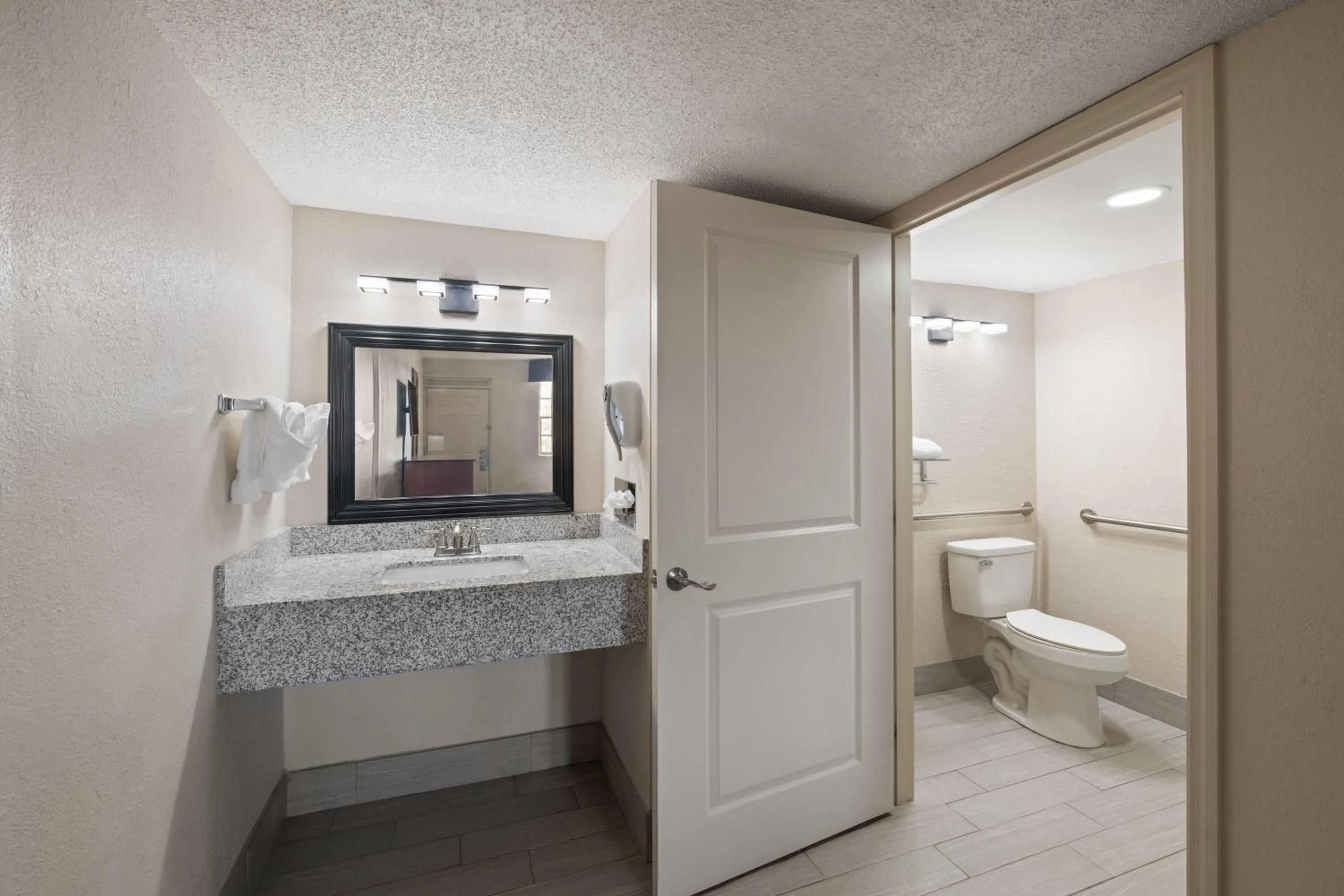 Shower in Super 8 by Wyndham Lake City