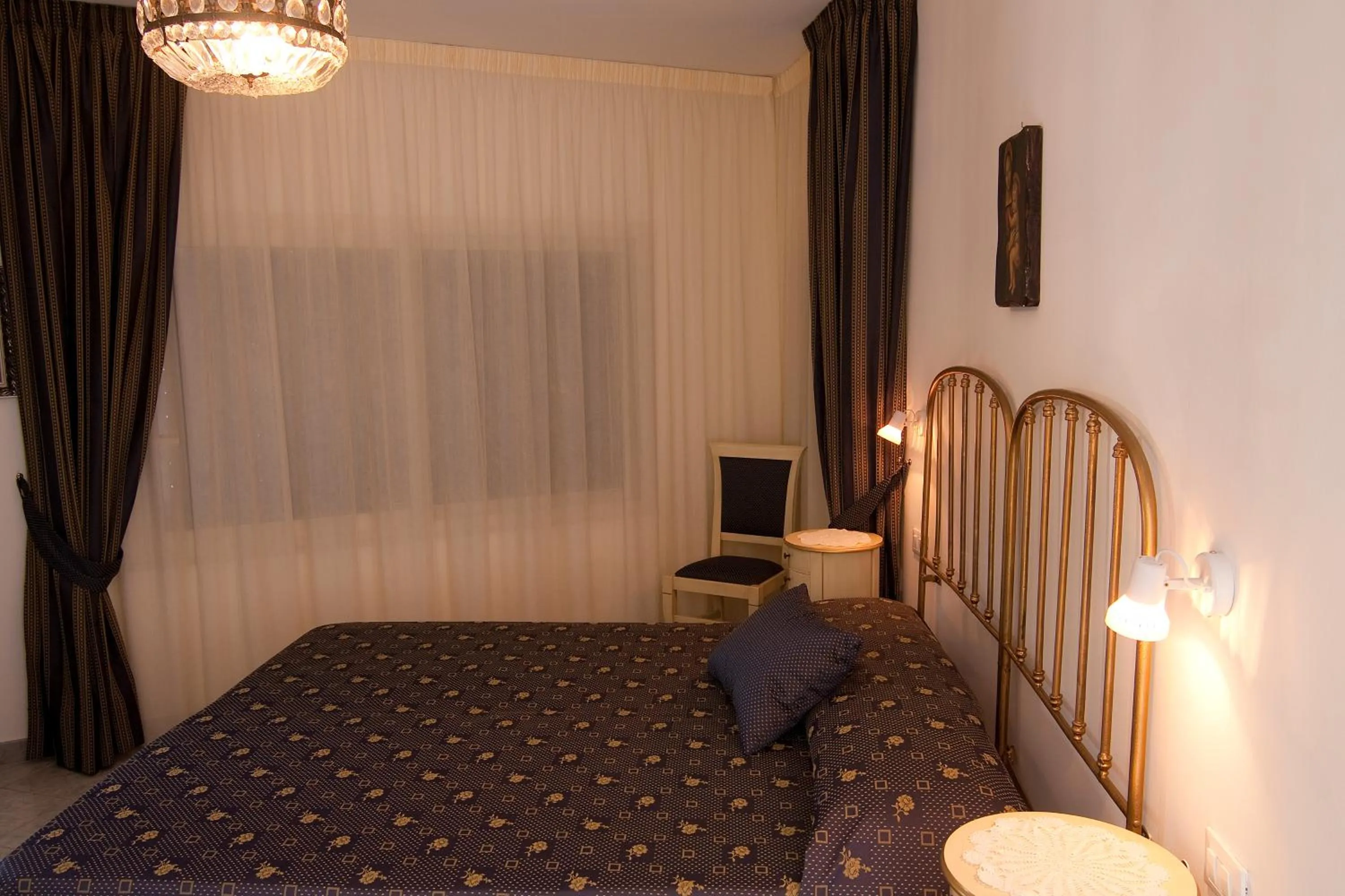 Photo of the whole room, Bed in B&B U Palmentu