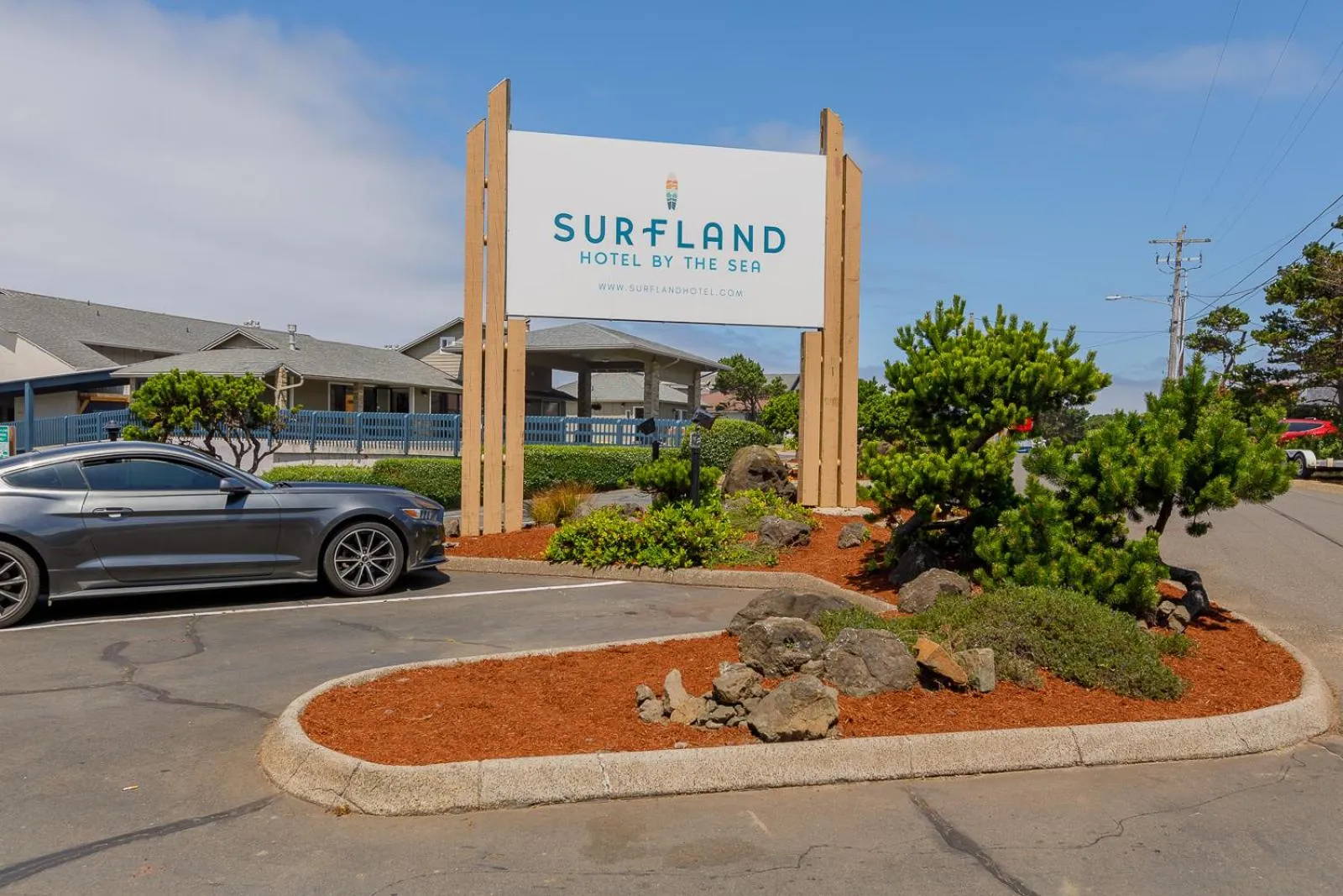 Property logo or sign in Surfland Hotel