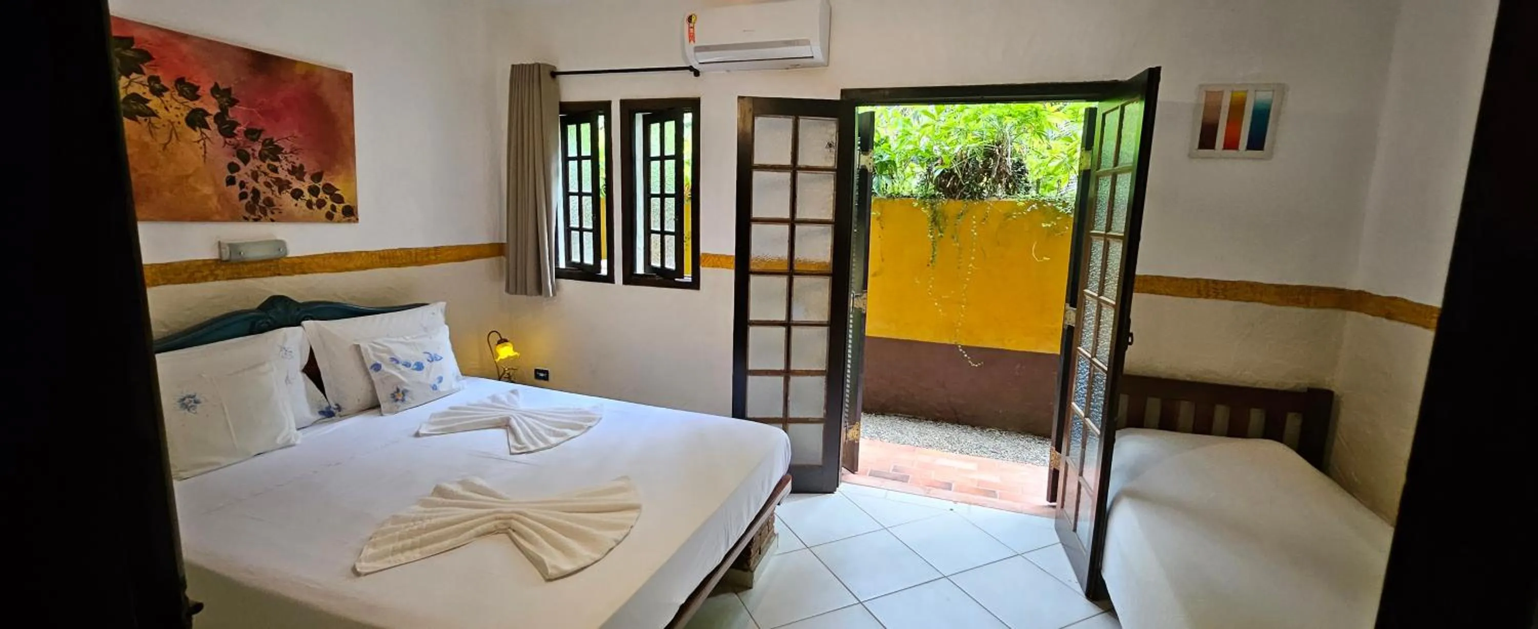 Bed in Hotel Pousada Katmandu