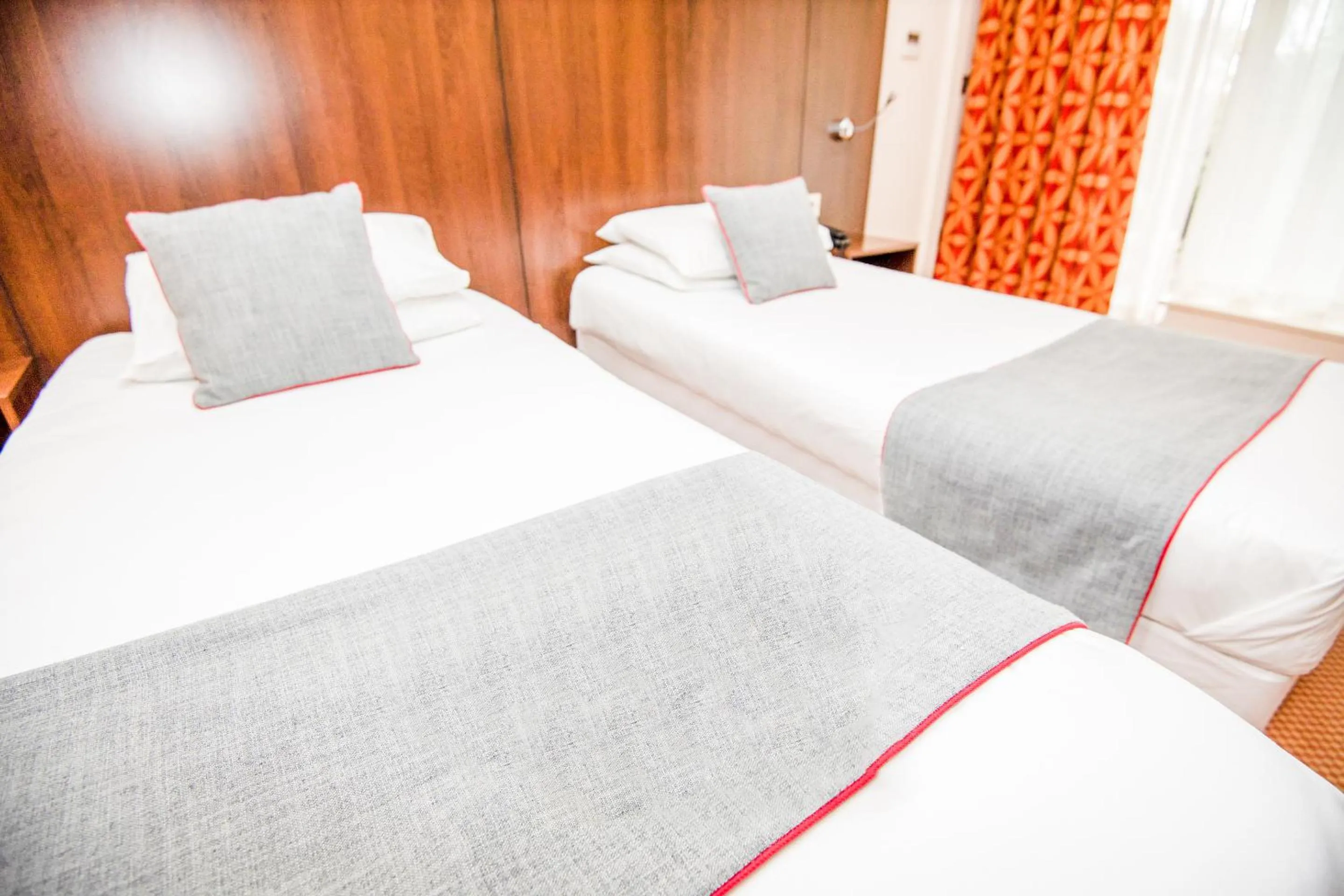 Bed in The Bridge House Hotel