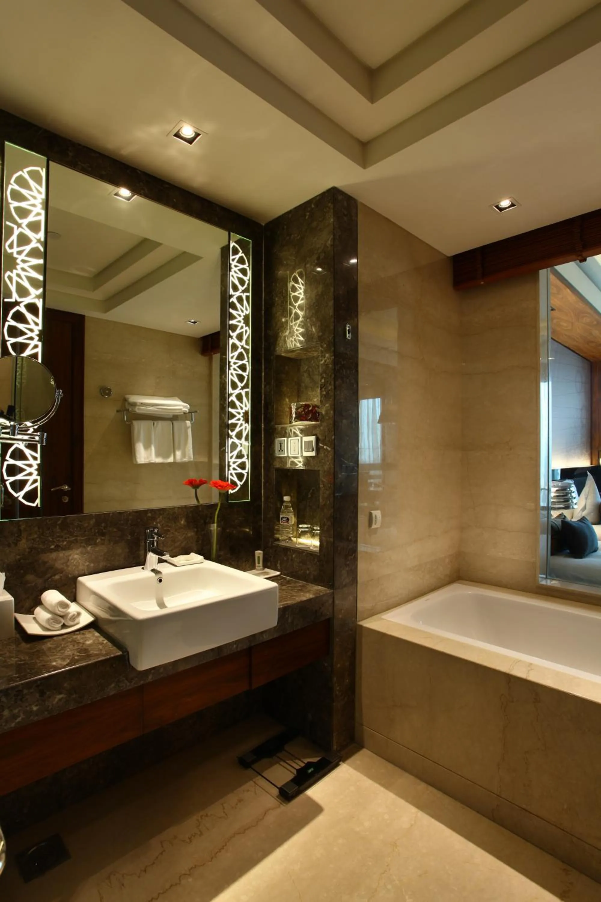Bathroom in Crowne Plaza New Delhi Rohini by IHG