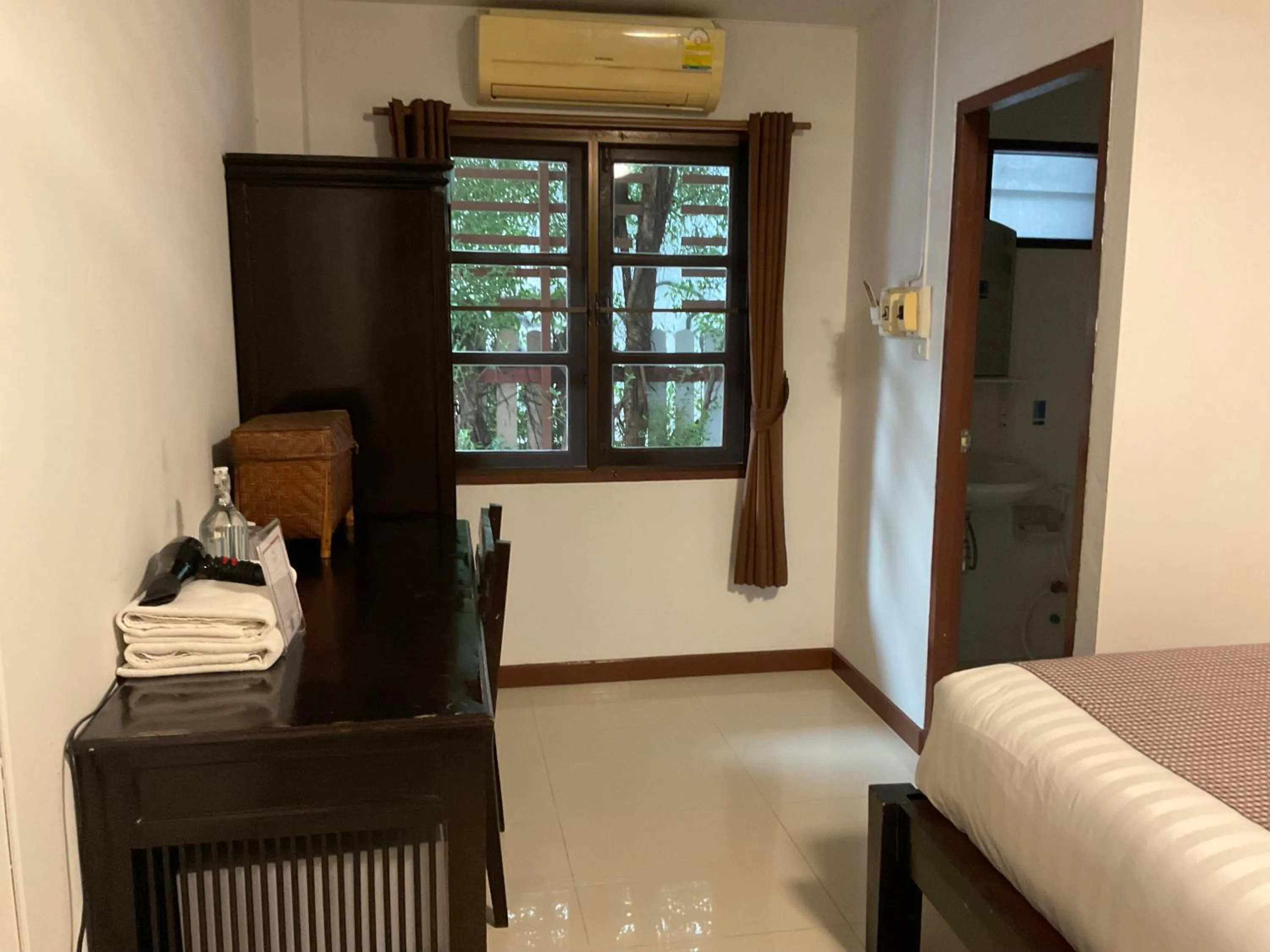 Bed in Baan Klang Vieng