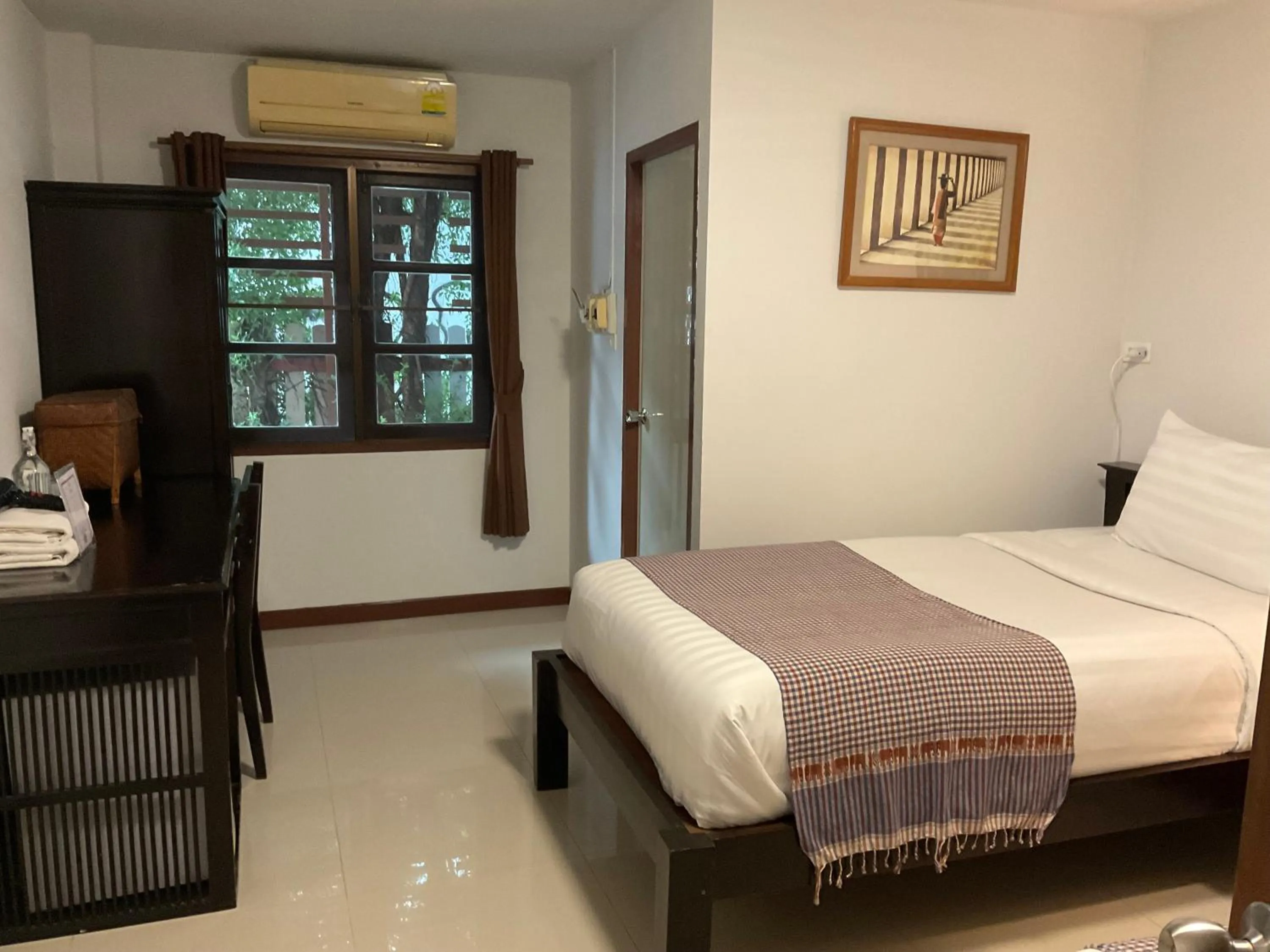 Bed in Baan Klang Vieng