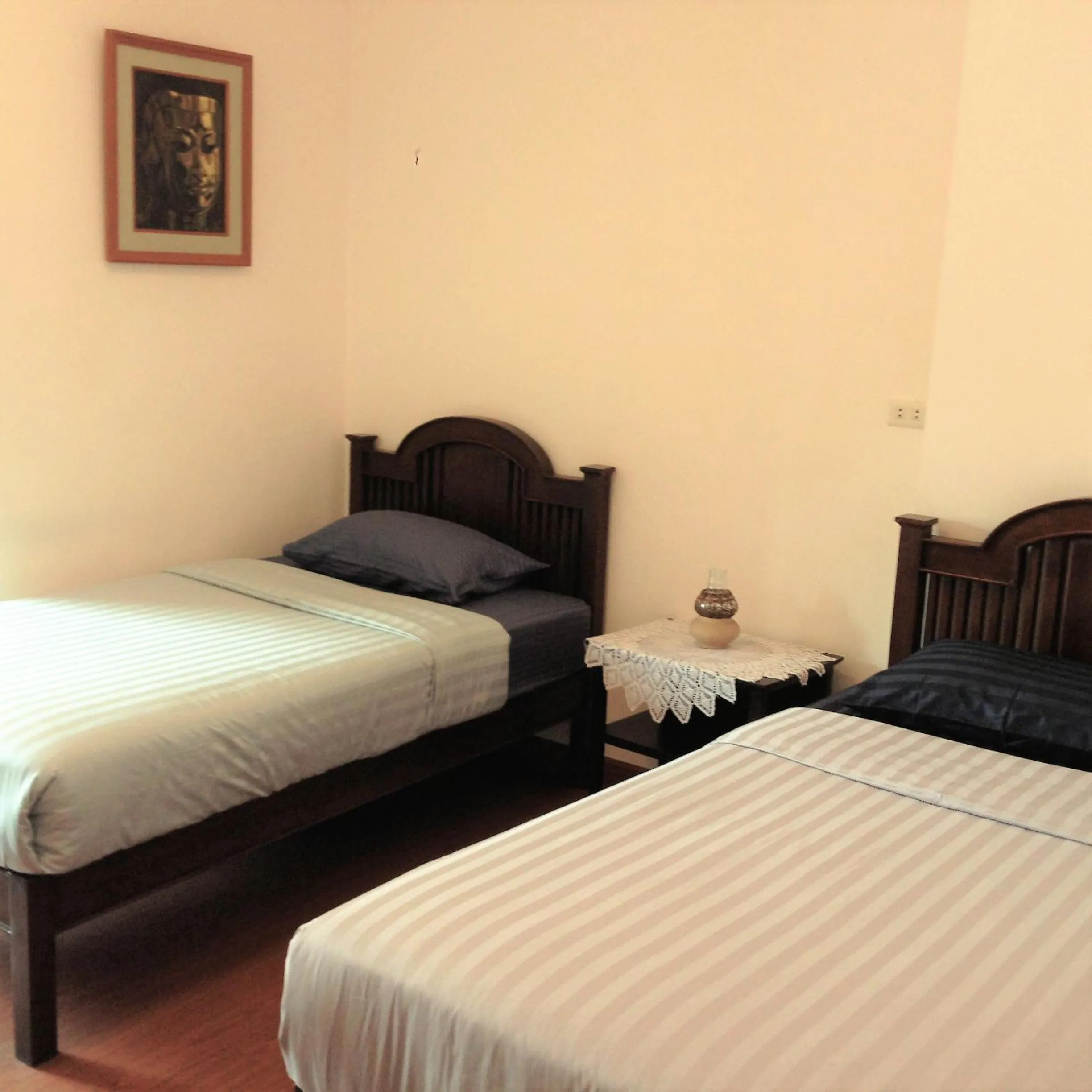 Bed in Baan Klang Vieng