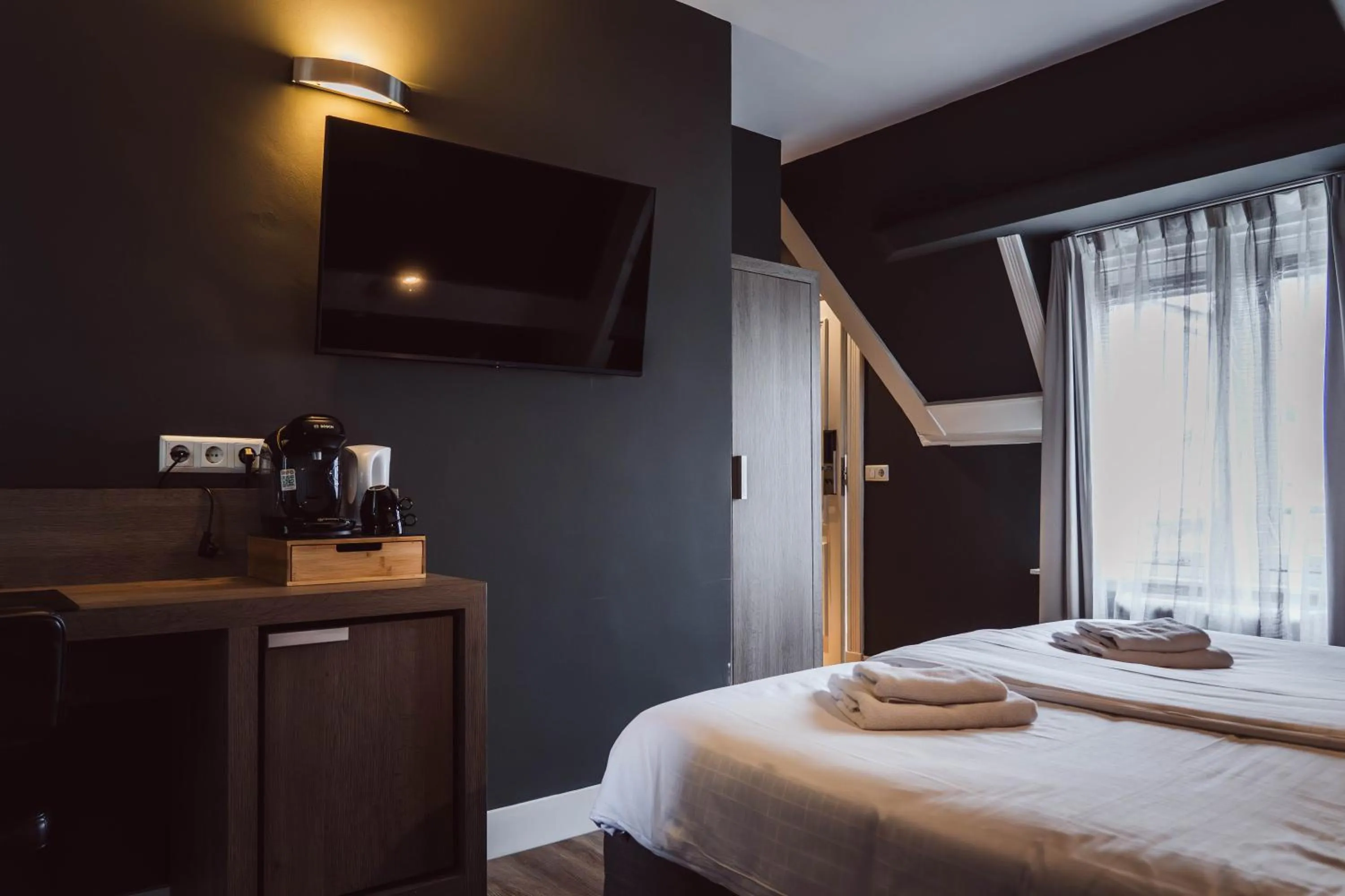 Bed in Tres Boutique Hotel