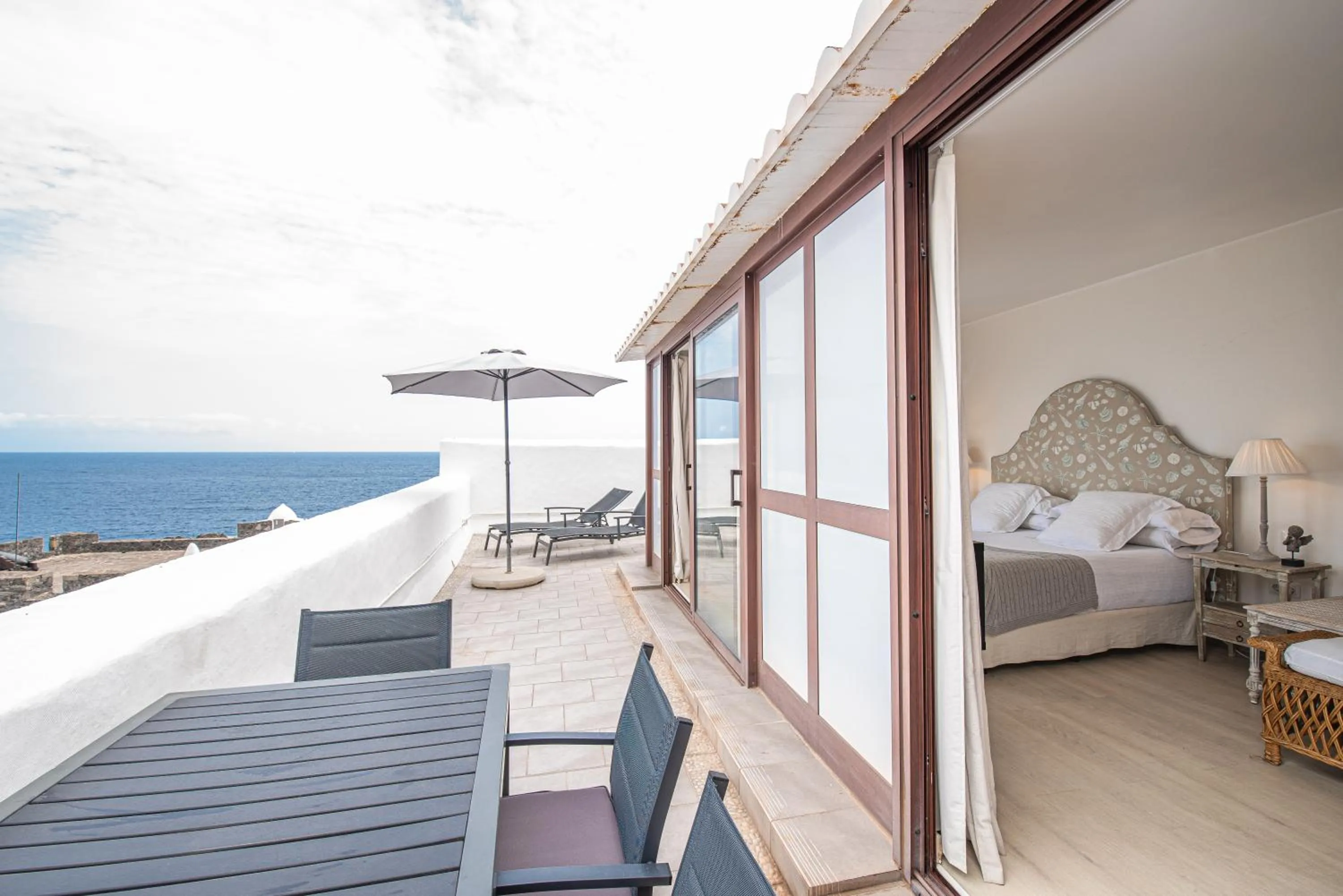 Bed in Isla Baja Suites