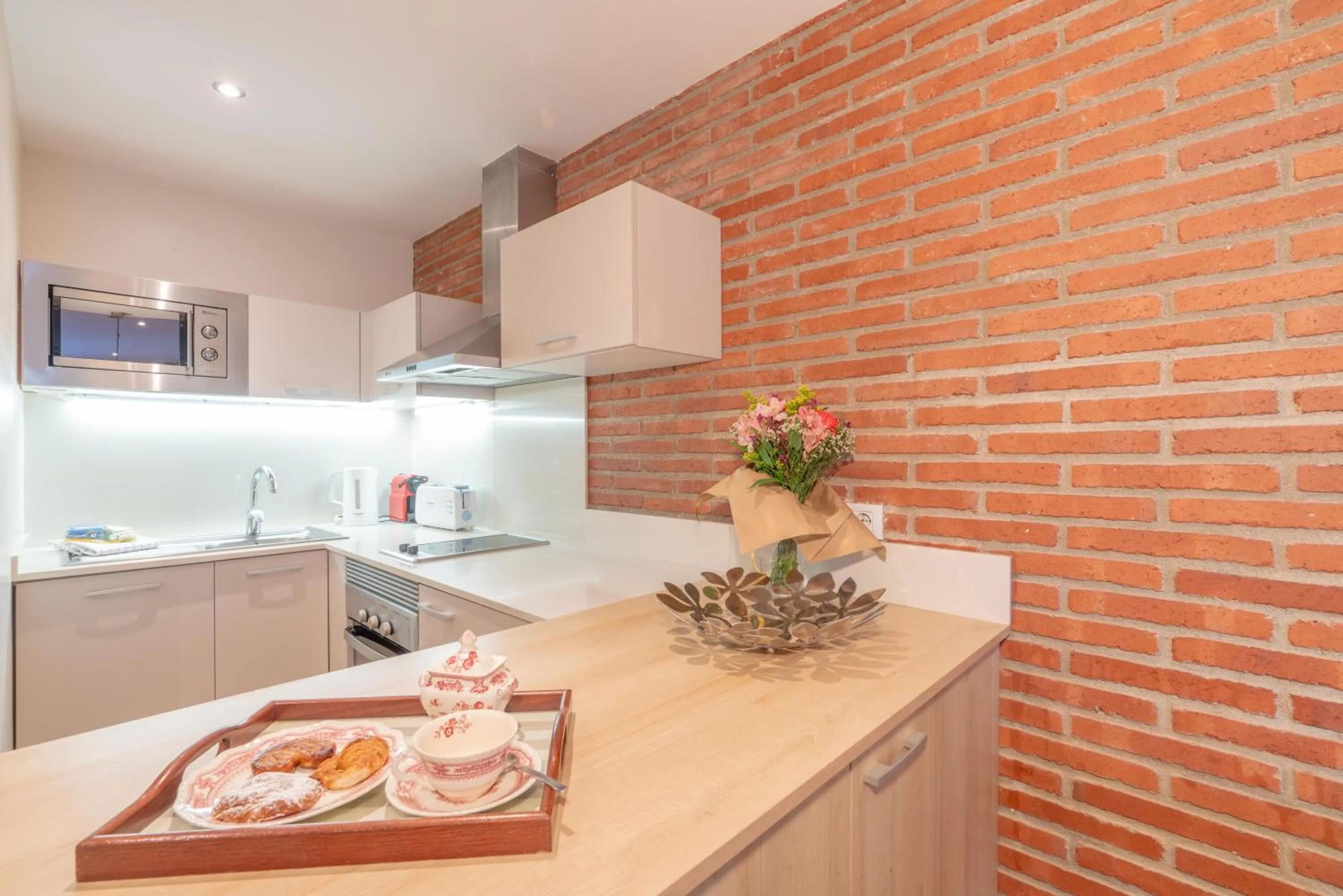 Kitchen or kitchenette in Serennia Cest Apartamentos Arc de Triomf