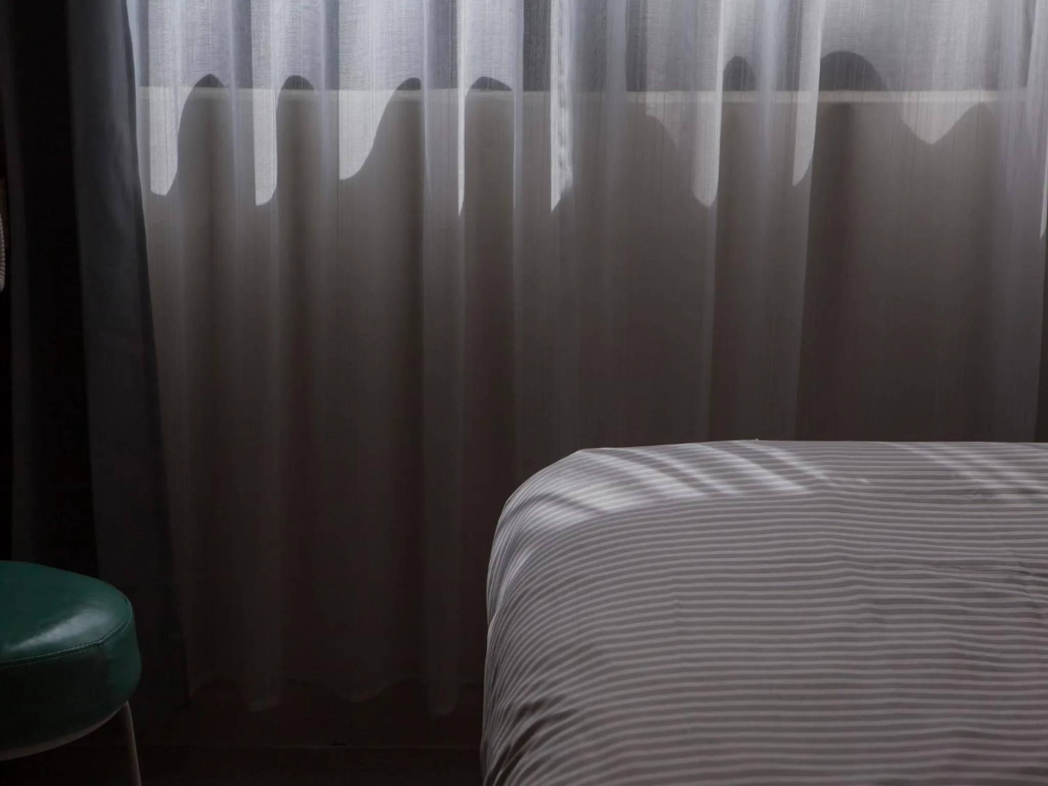 Bed in Rainbow Hotel