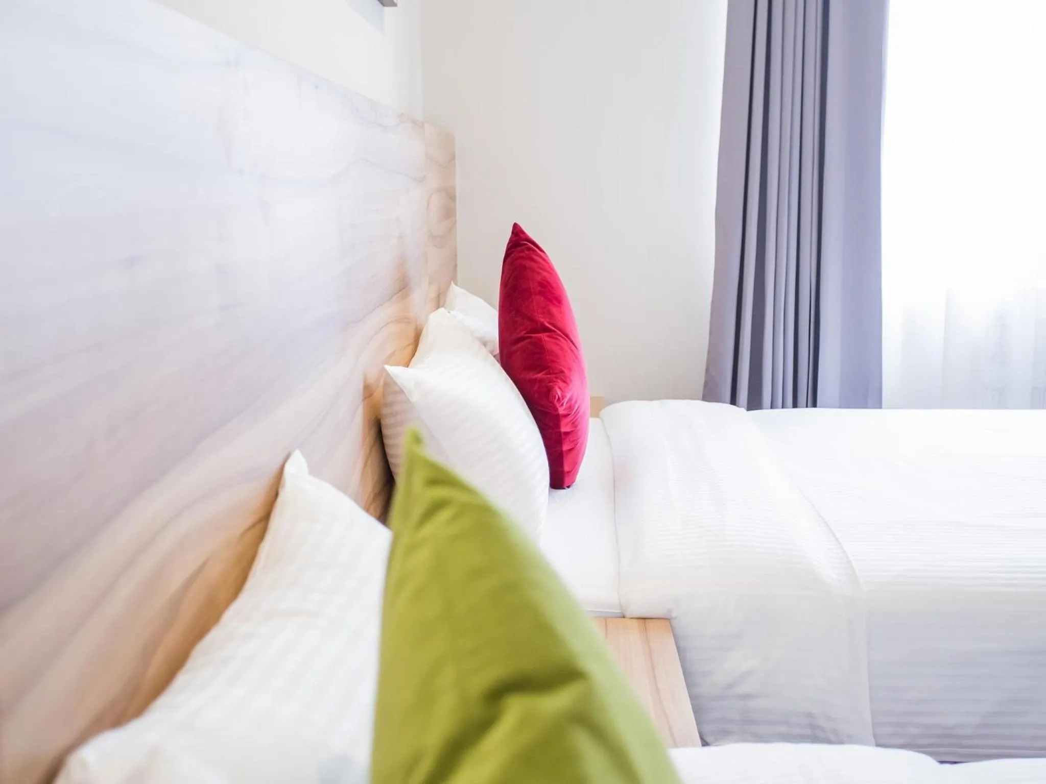 Bed in Rainbow Hotel