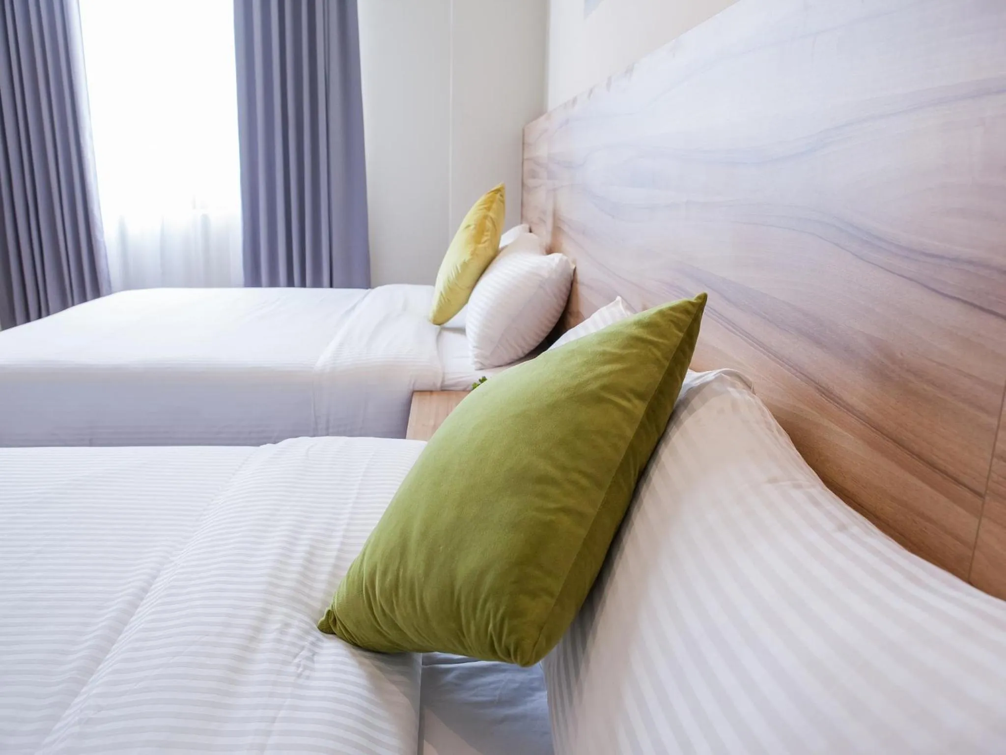 Bed in Rainbow Hotel