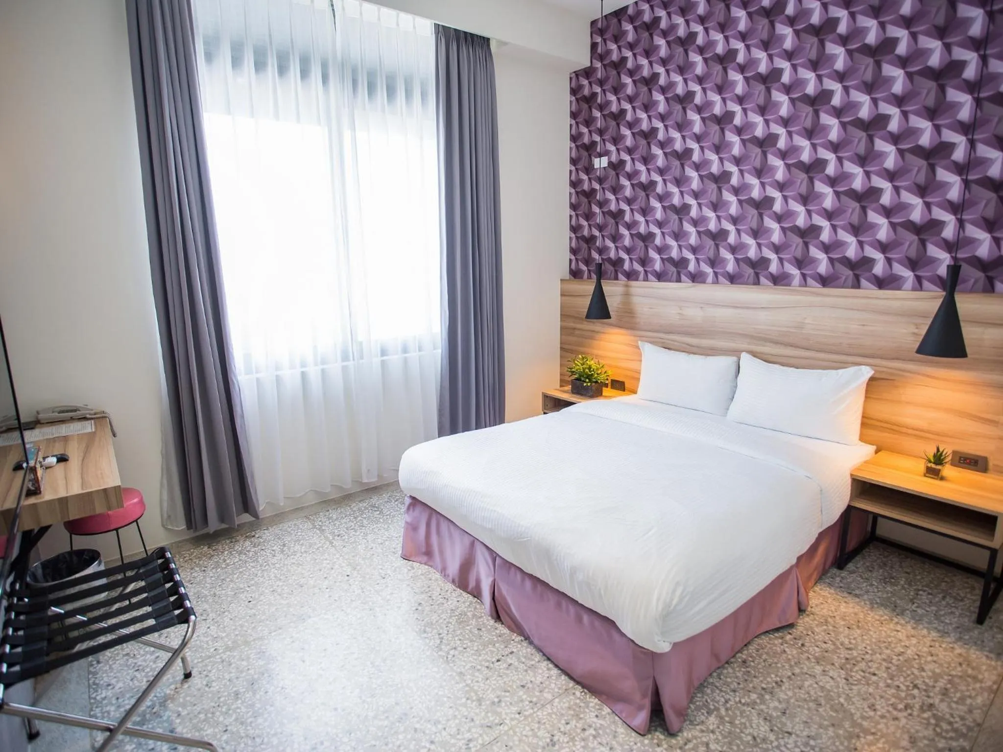 Bed in Rainbow Hotel