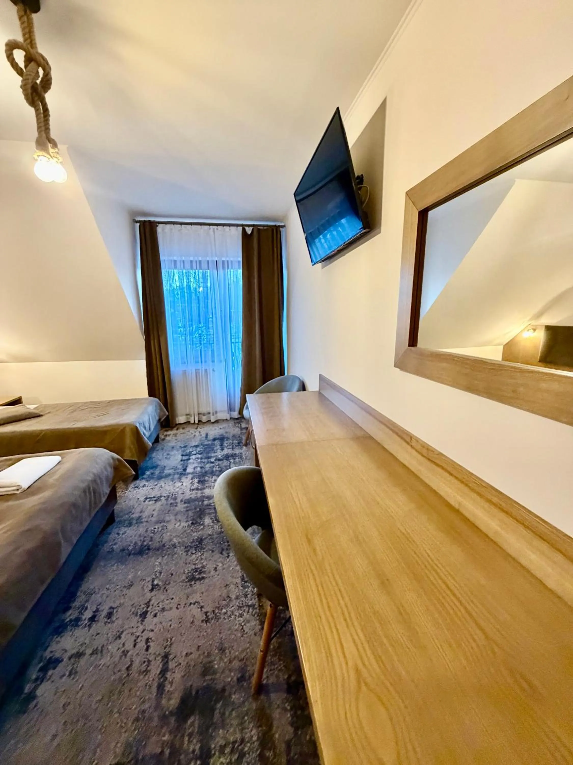 Bed in ZAJAZD BIAŁCZAŃSKI Dom Wypoczynkowy Restauracja blisko Stoków Narciarskich