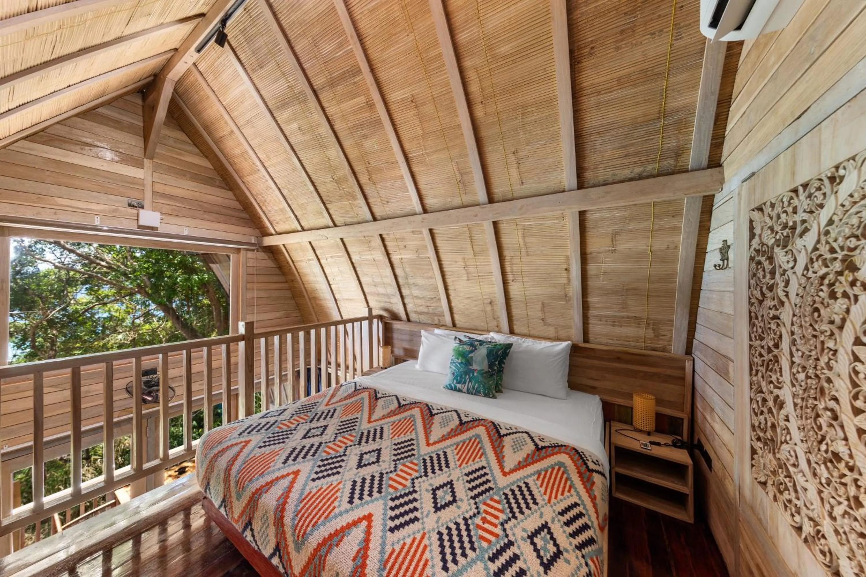 Bed in Karuna El Nido Villas