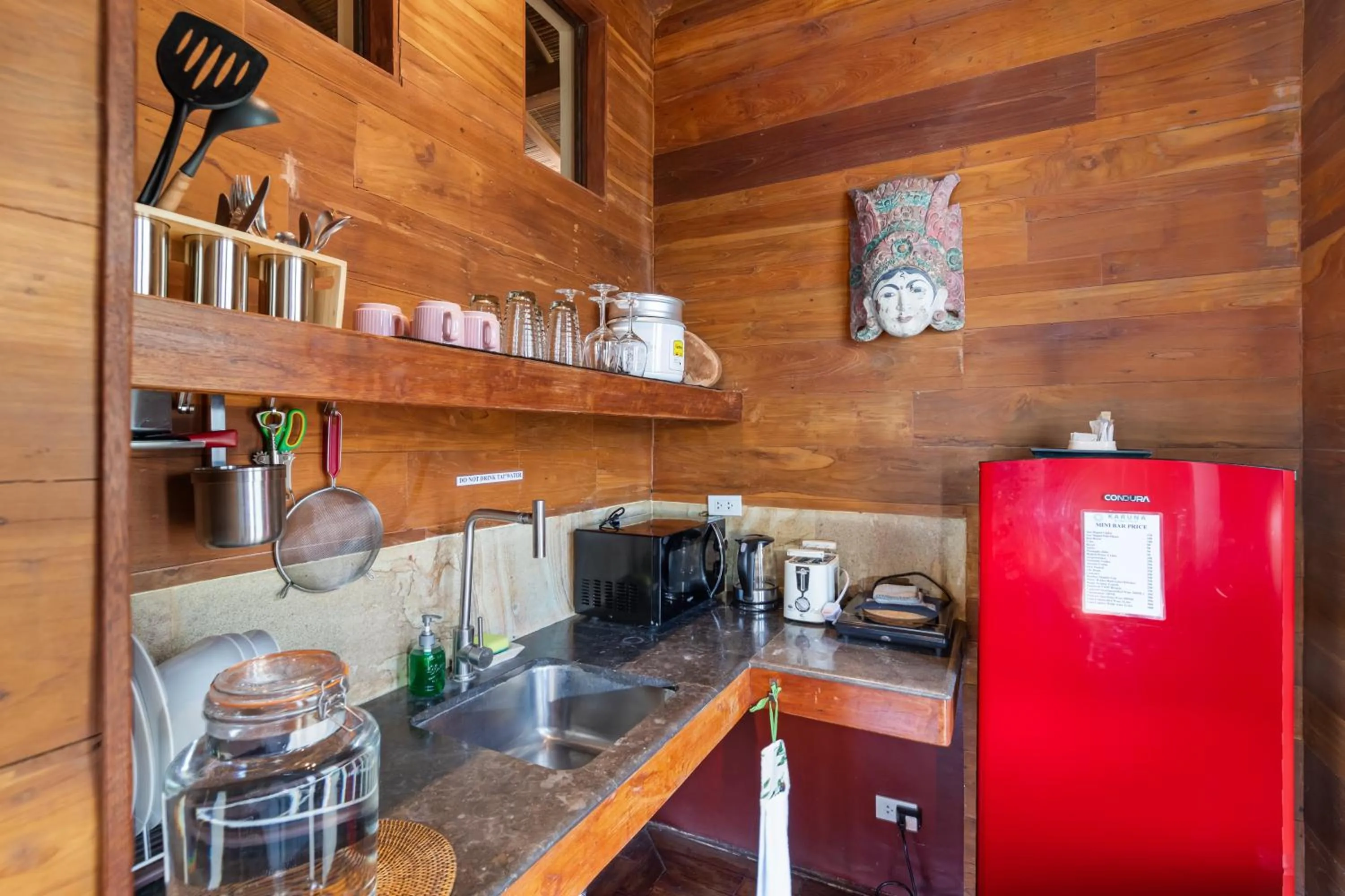 Kitchen or kitchenette in Karuna El Nido Villas