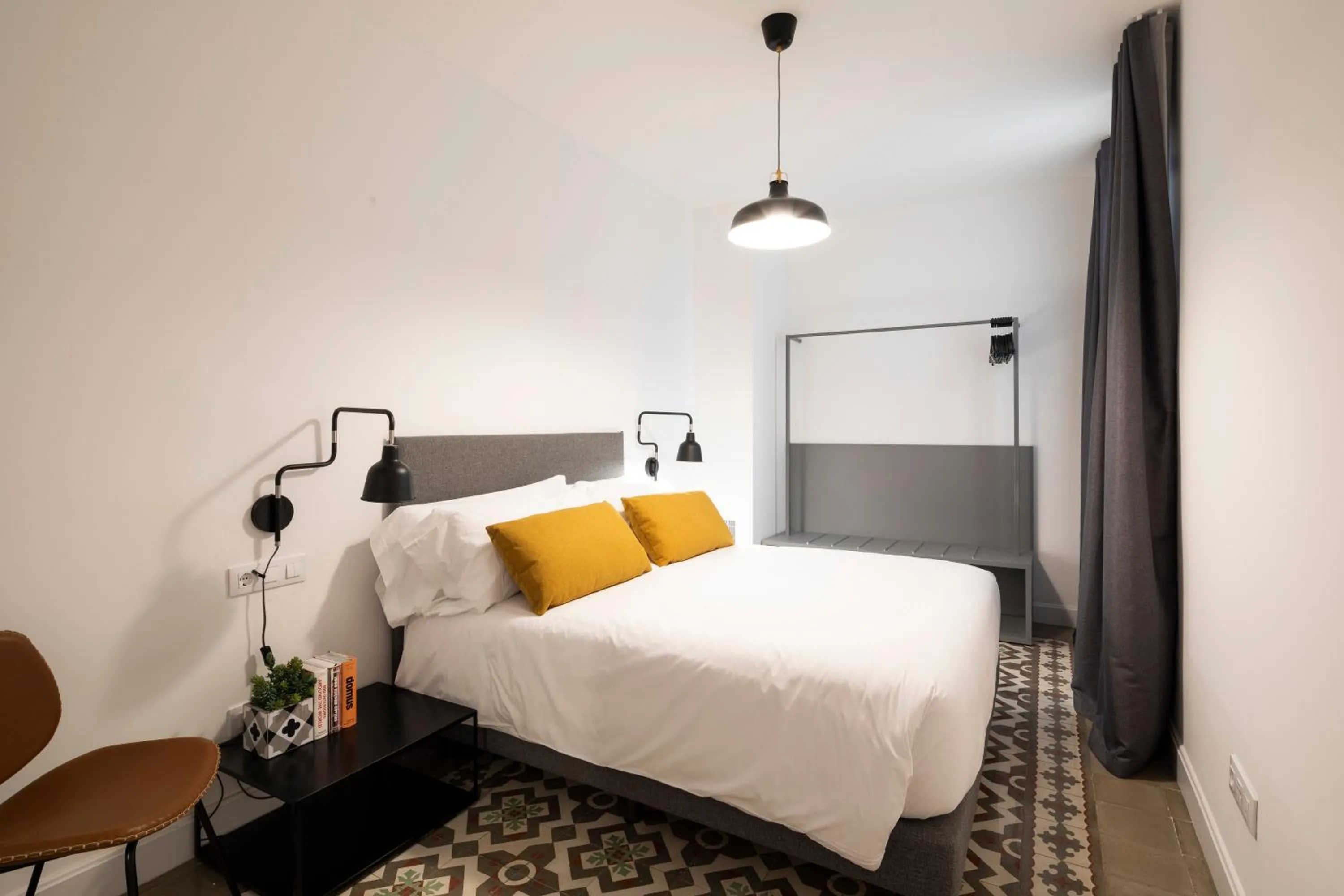 Bed in Aspasios Sagrada Familia Apartments