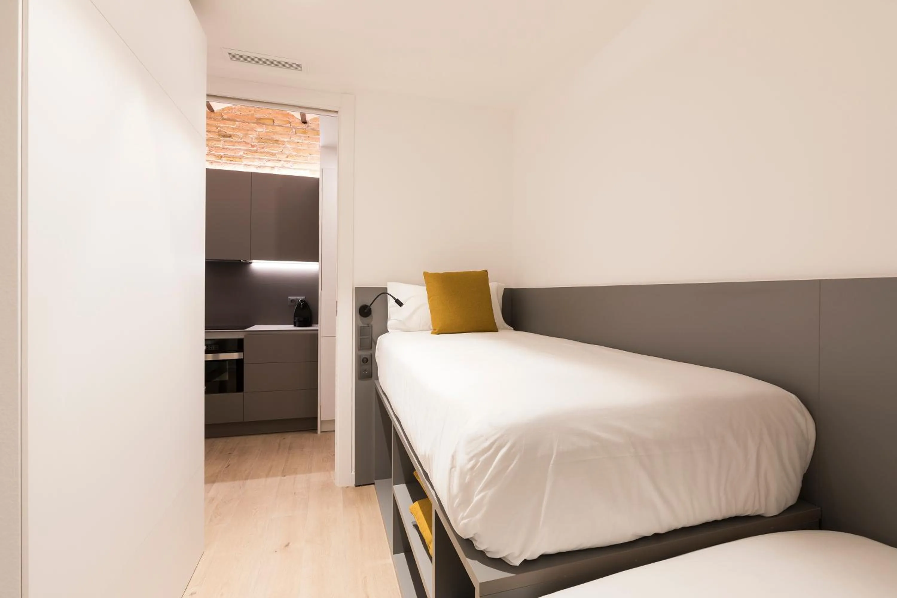 Bed in Aspasios Sagrada Familia Apartments