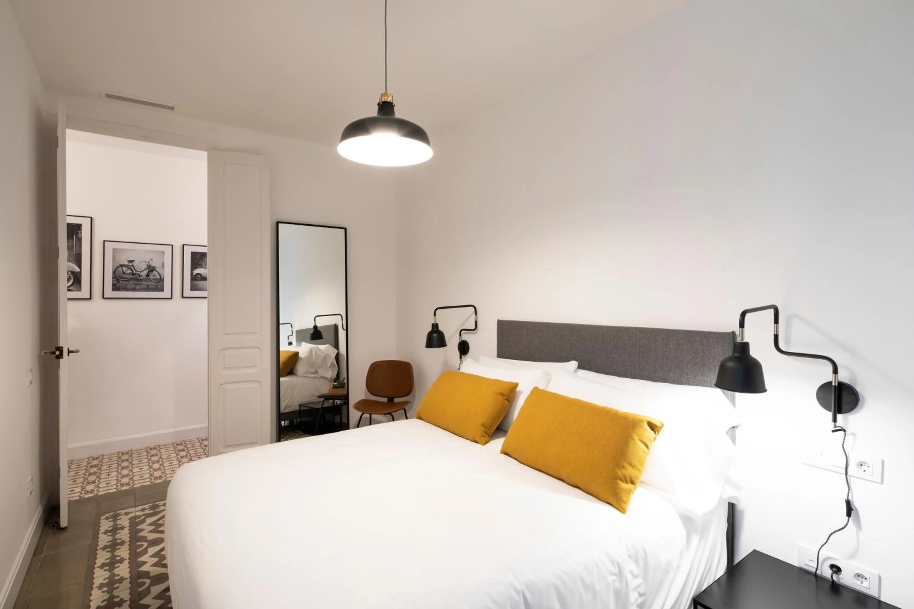 Bed in Aspasios Sagrada Familia Apartments