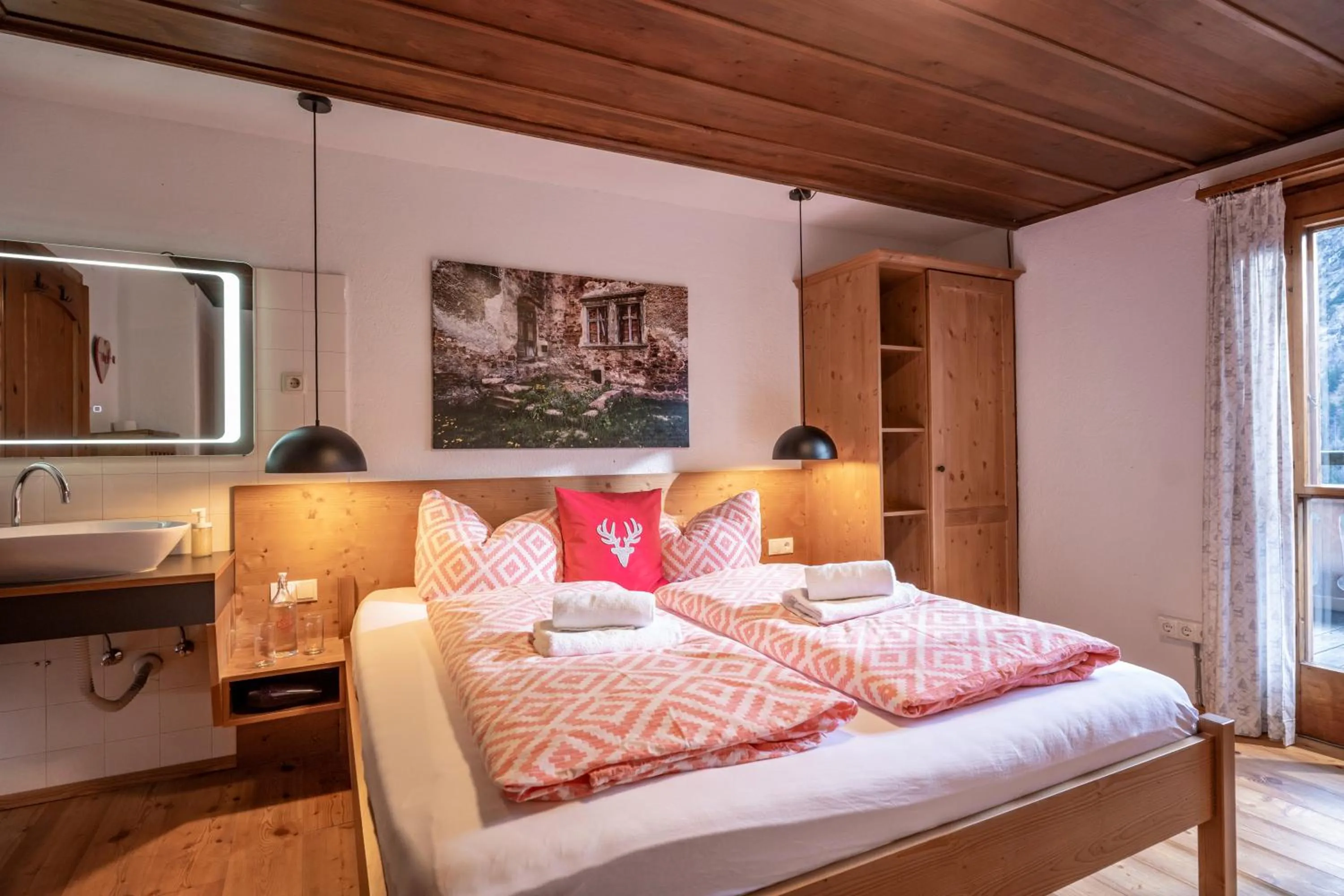 Bed in Berg'k'hof Kaisertal - Alpine Hideaway