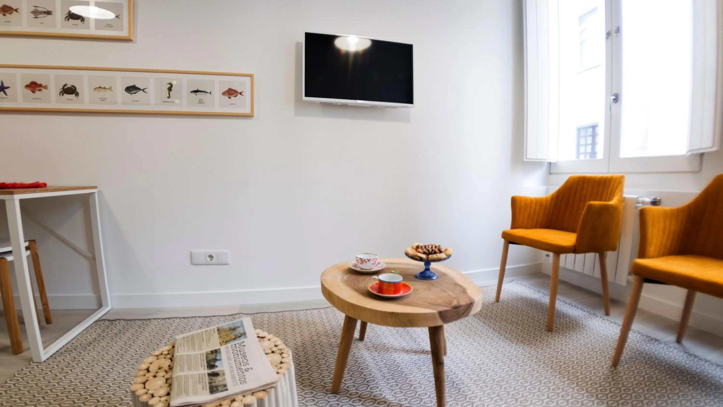 Living room, TV/Entertainment Center in El Faro de Pepa by Como en Casa
