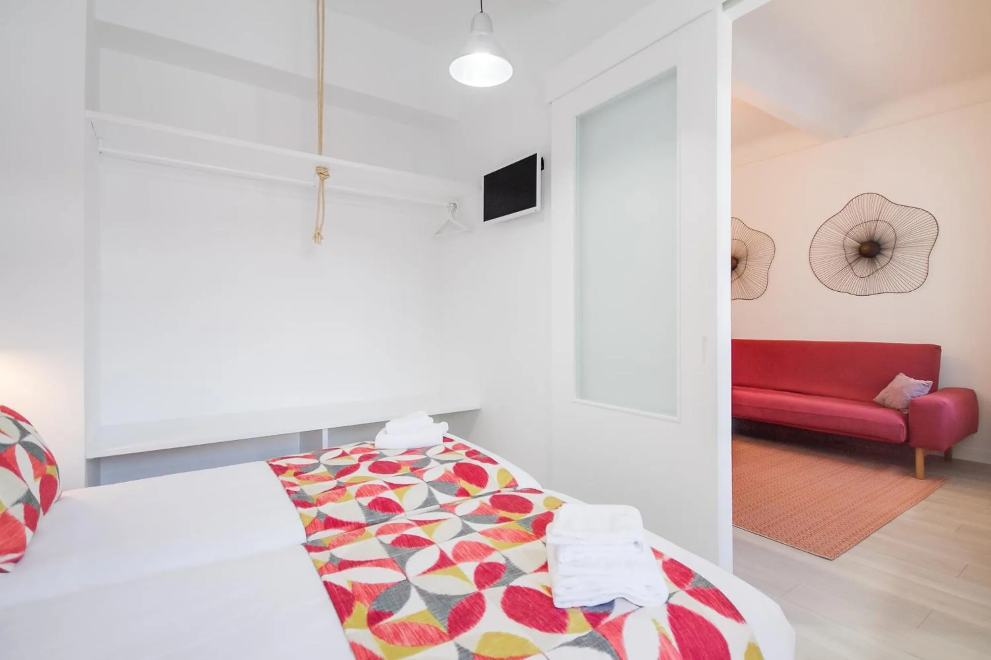 Living room, Bed in El Faro de Pepa by Como en Casa