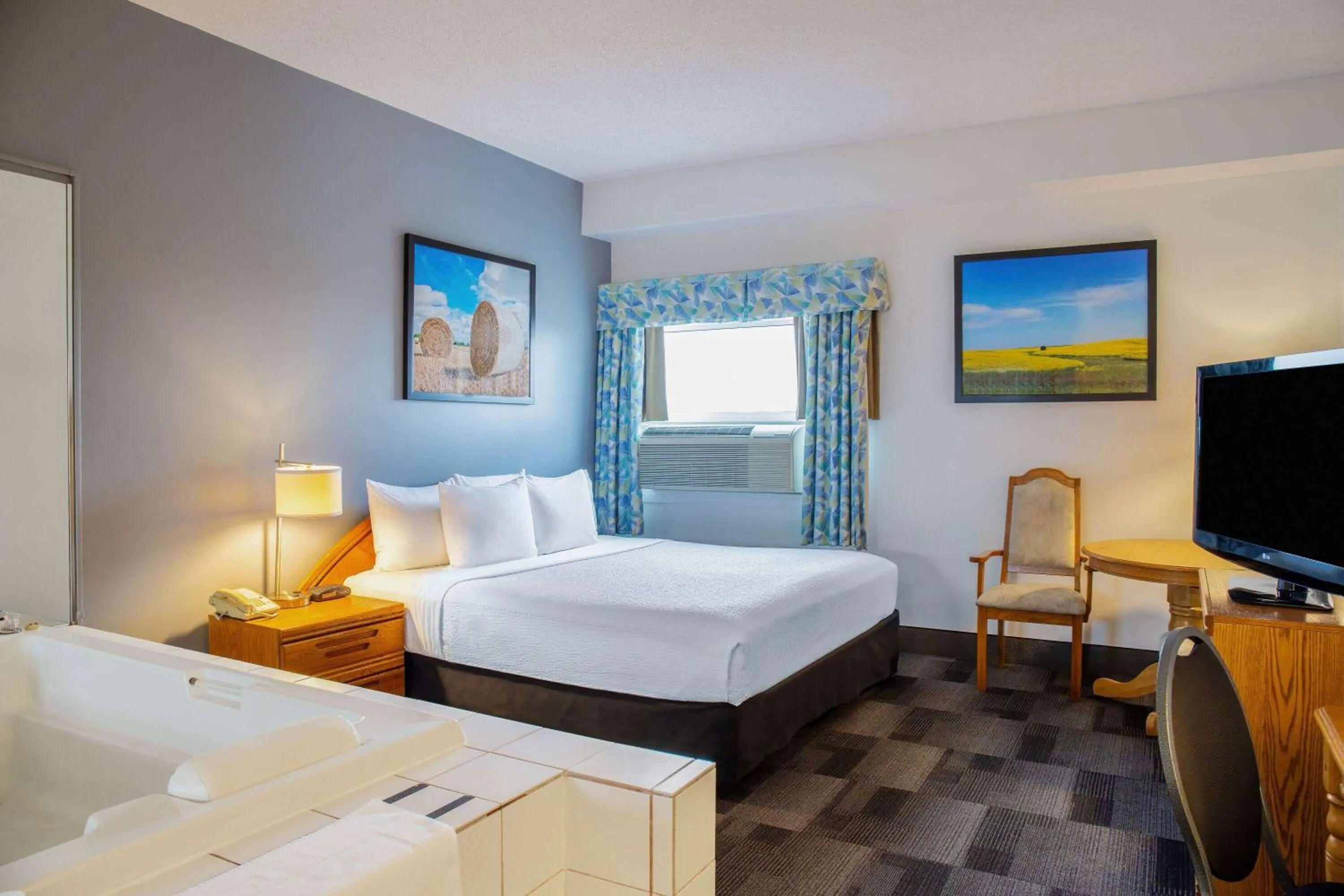 Bed in Days Inn & Conference Centre by Wyndham Camrose Norsemen