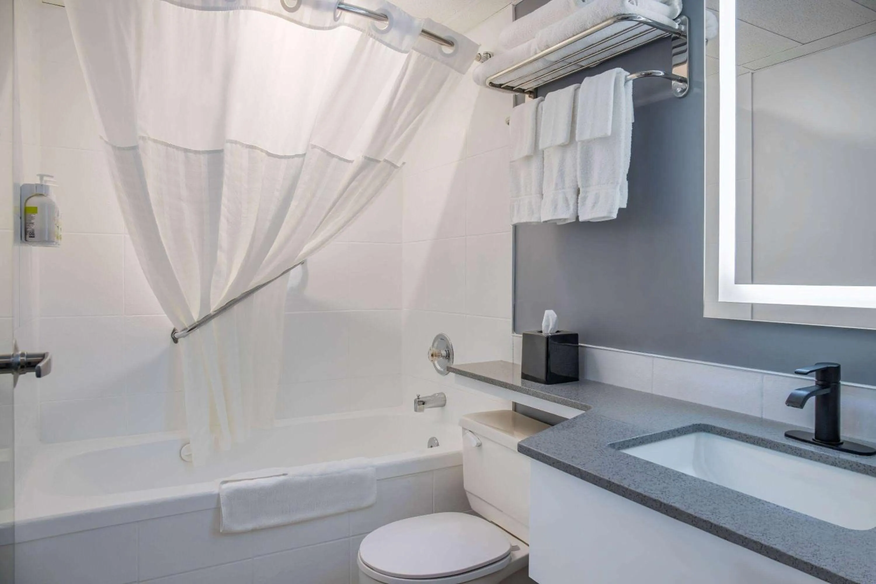 Bathroom in Days Inn & Conference Centre by Wyndham Camrose Norsemen