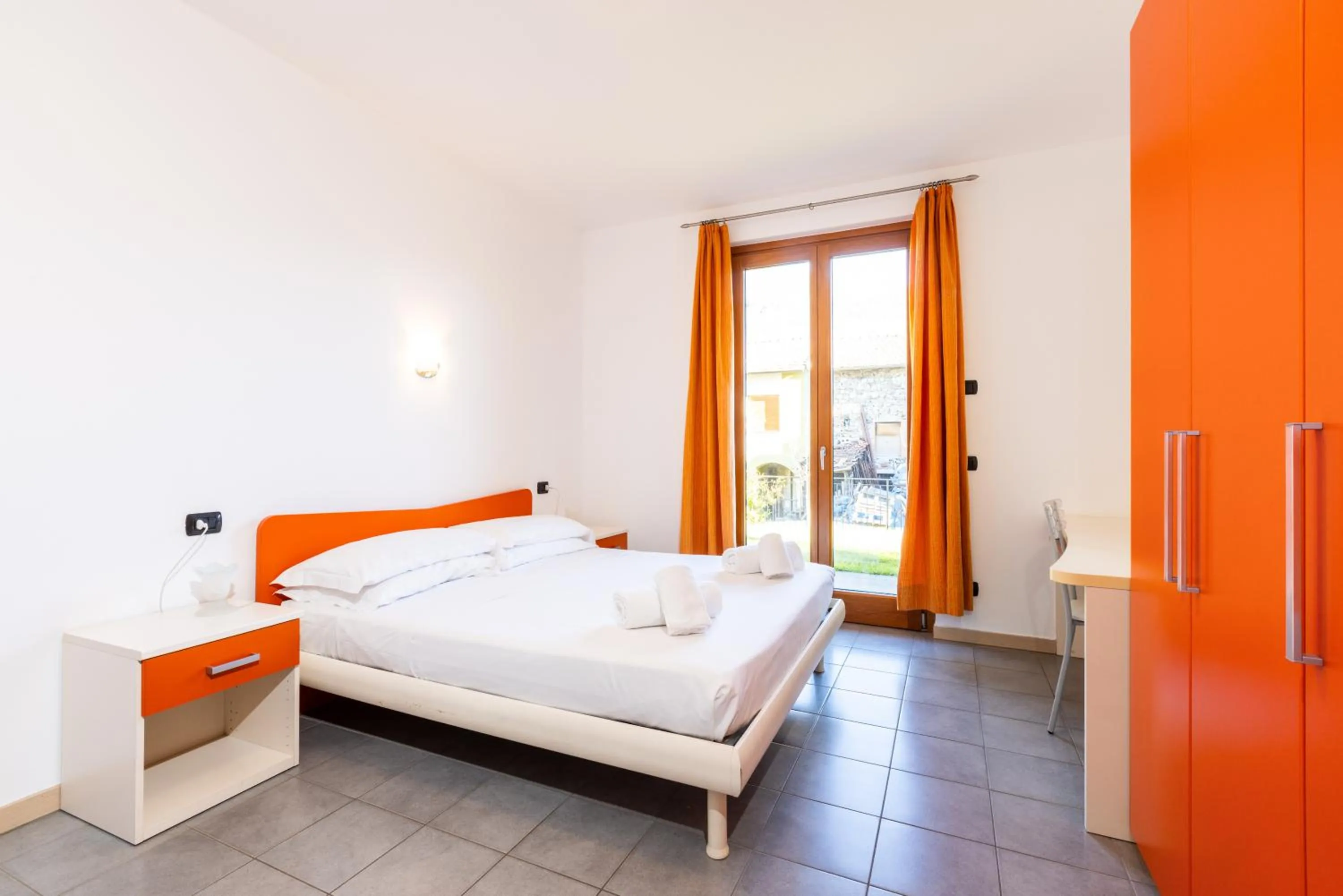 Bed in Spluga "Relax & Apartaments" by Alfio Colombo