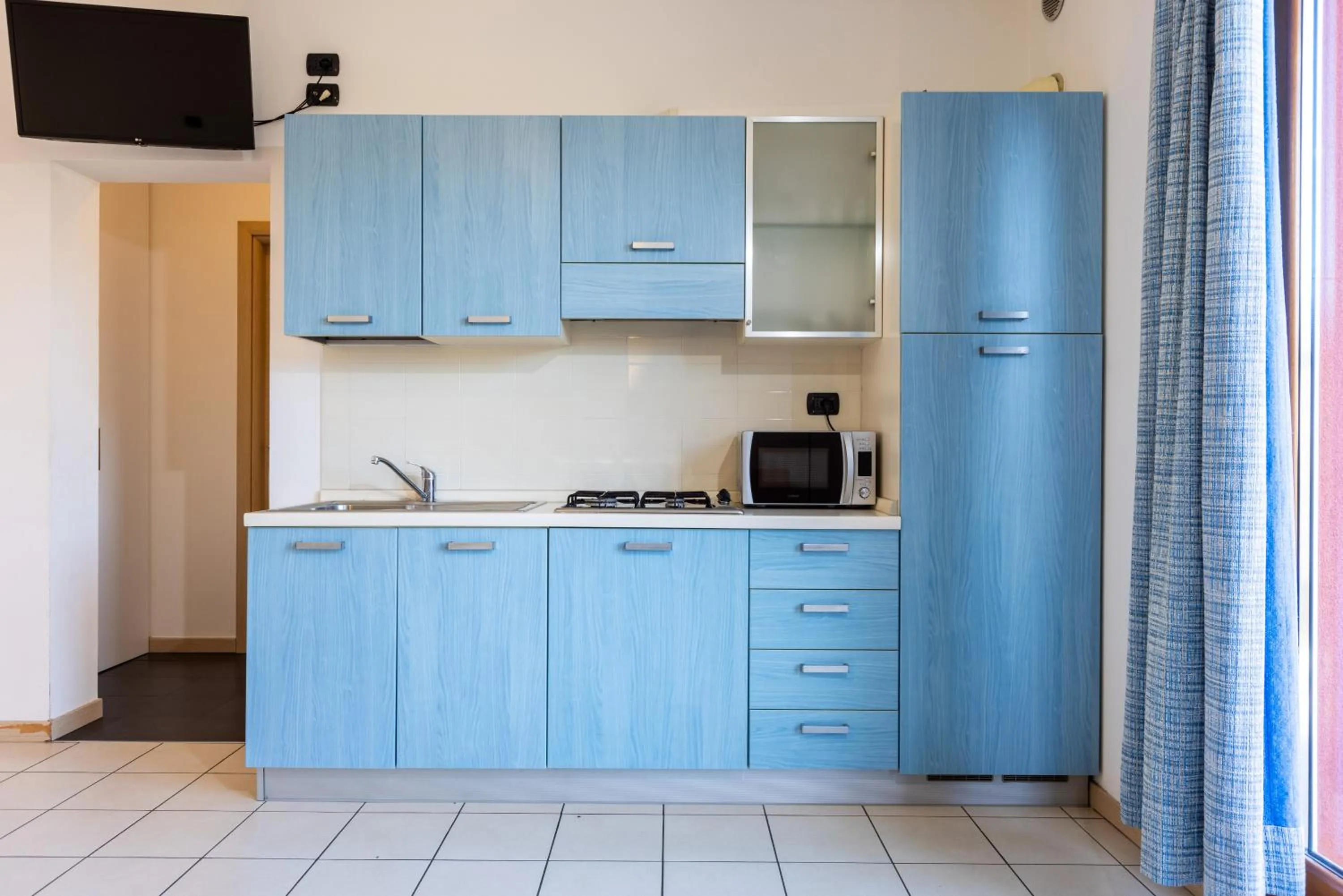 Kitchen or kitchenette in Spluga "Relax & Apartaments" by Alfio Colombo