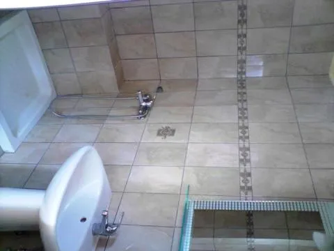 Bathroom in Nitsa Rooms