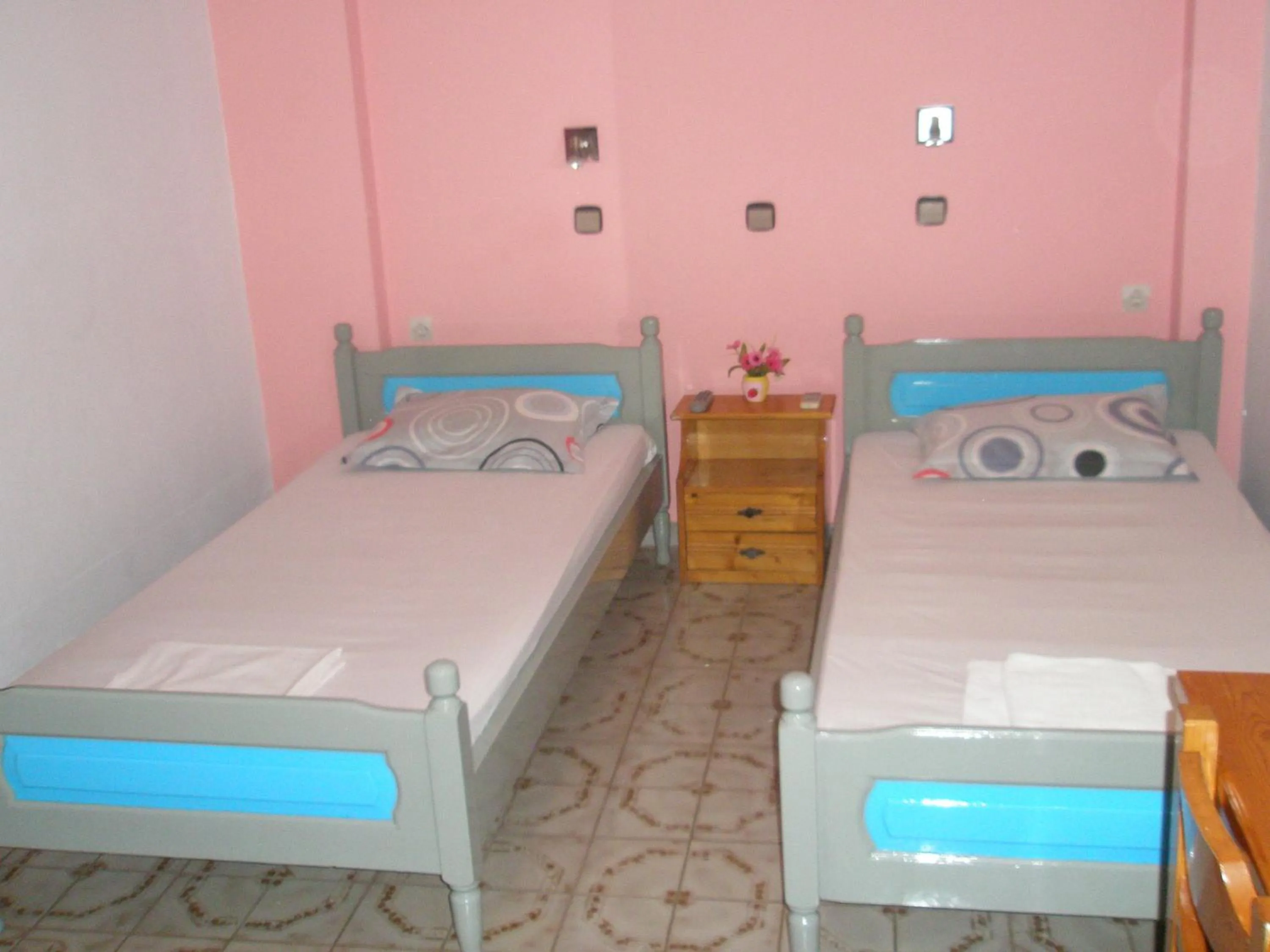 Bed in Nitsa Rooms