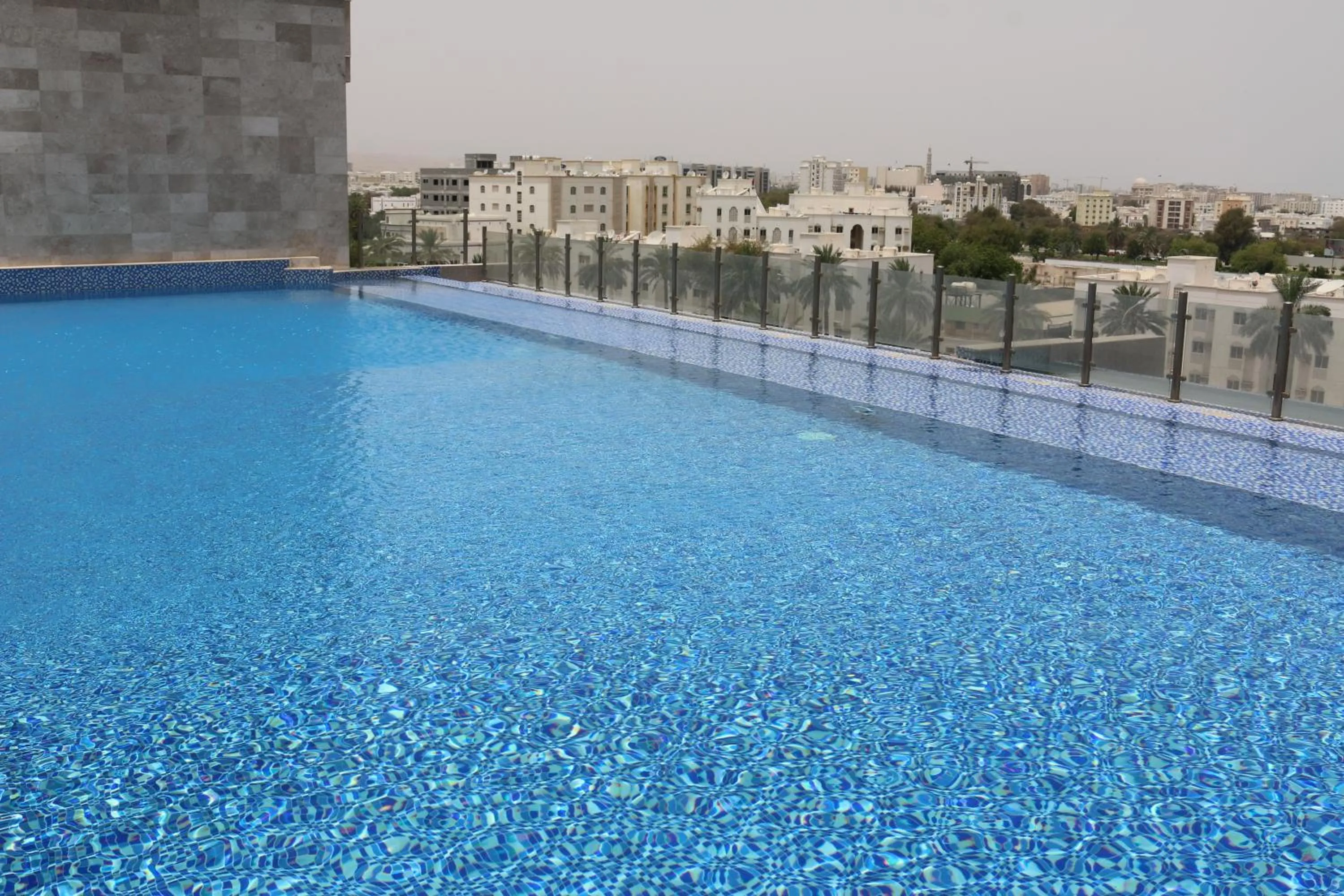 Swimming pool in Radisson Hotel Muscat Panorama