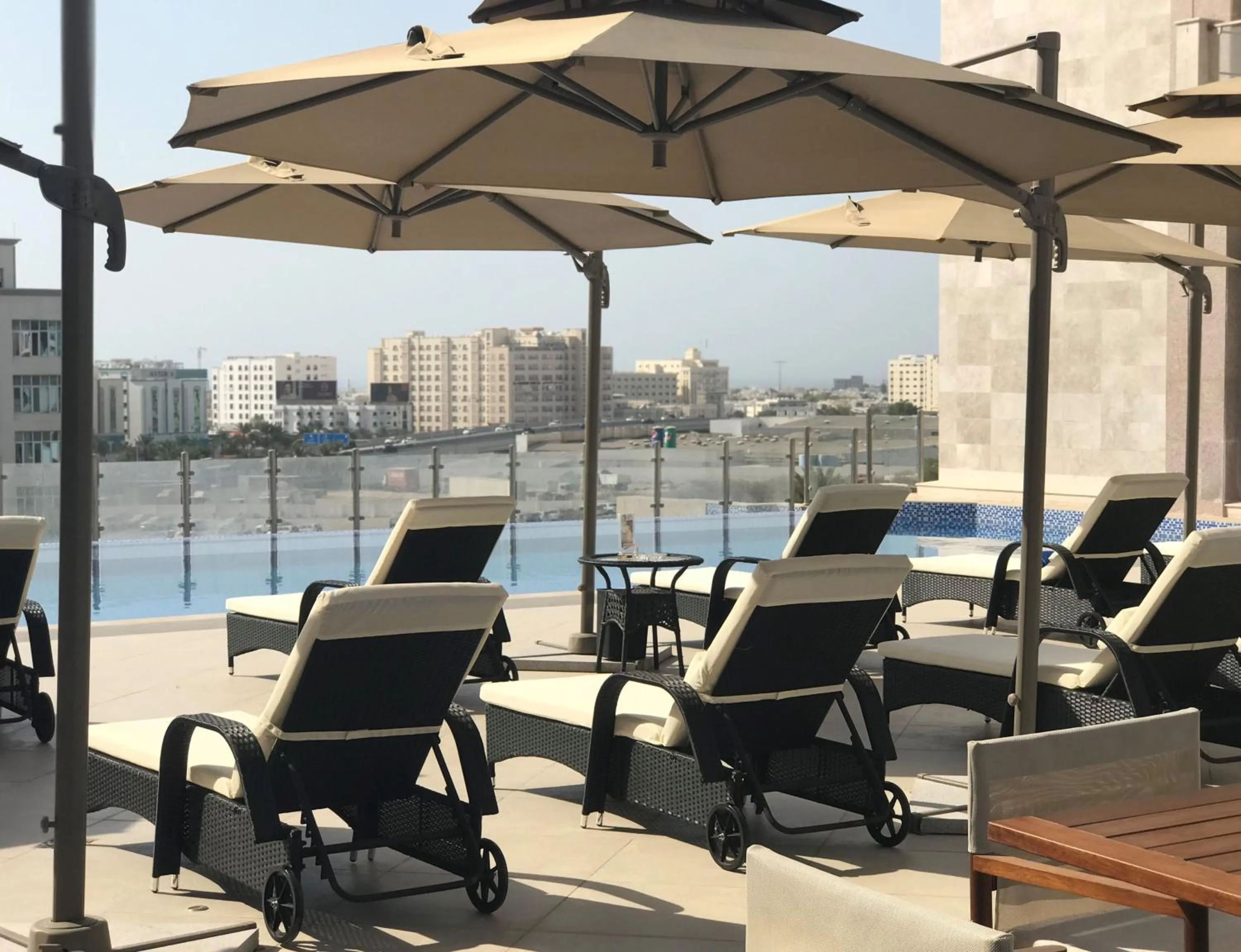 Swimming pool in Radisson Hotel Muscat Panorama