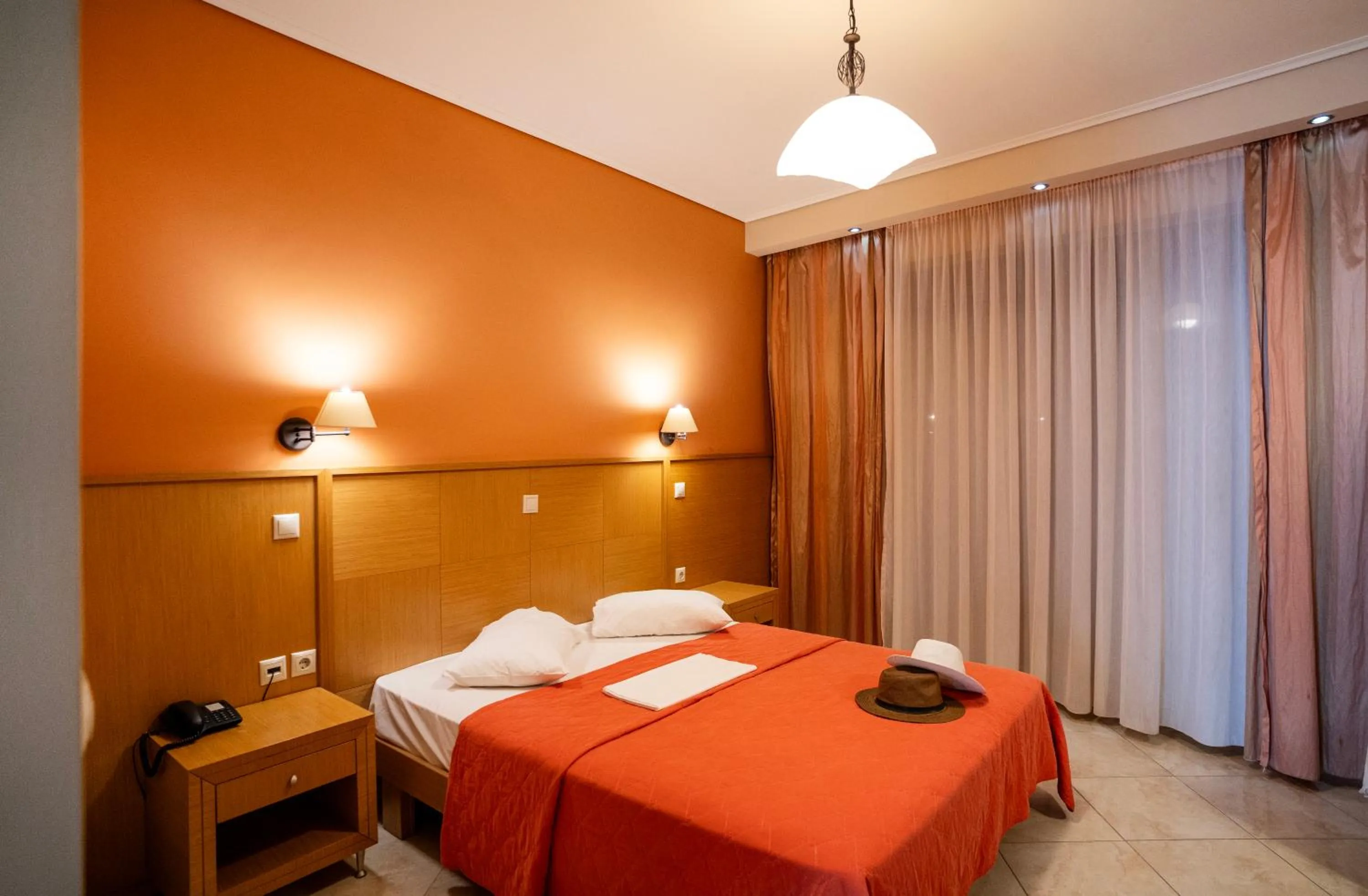 Bed in Evia Hotel & Suites