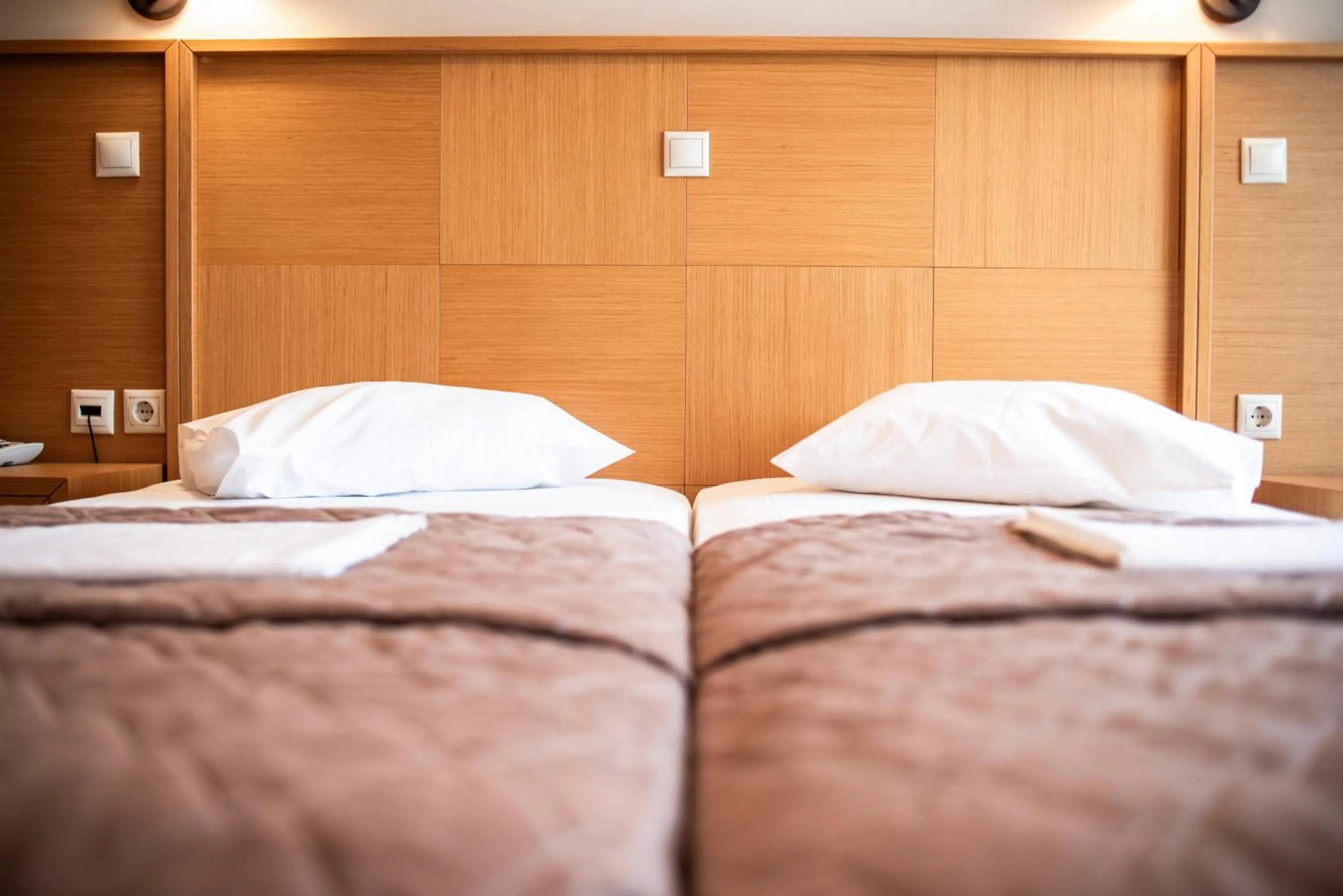 Bed in Evia Hotel & Suites