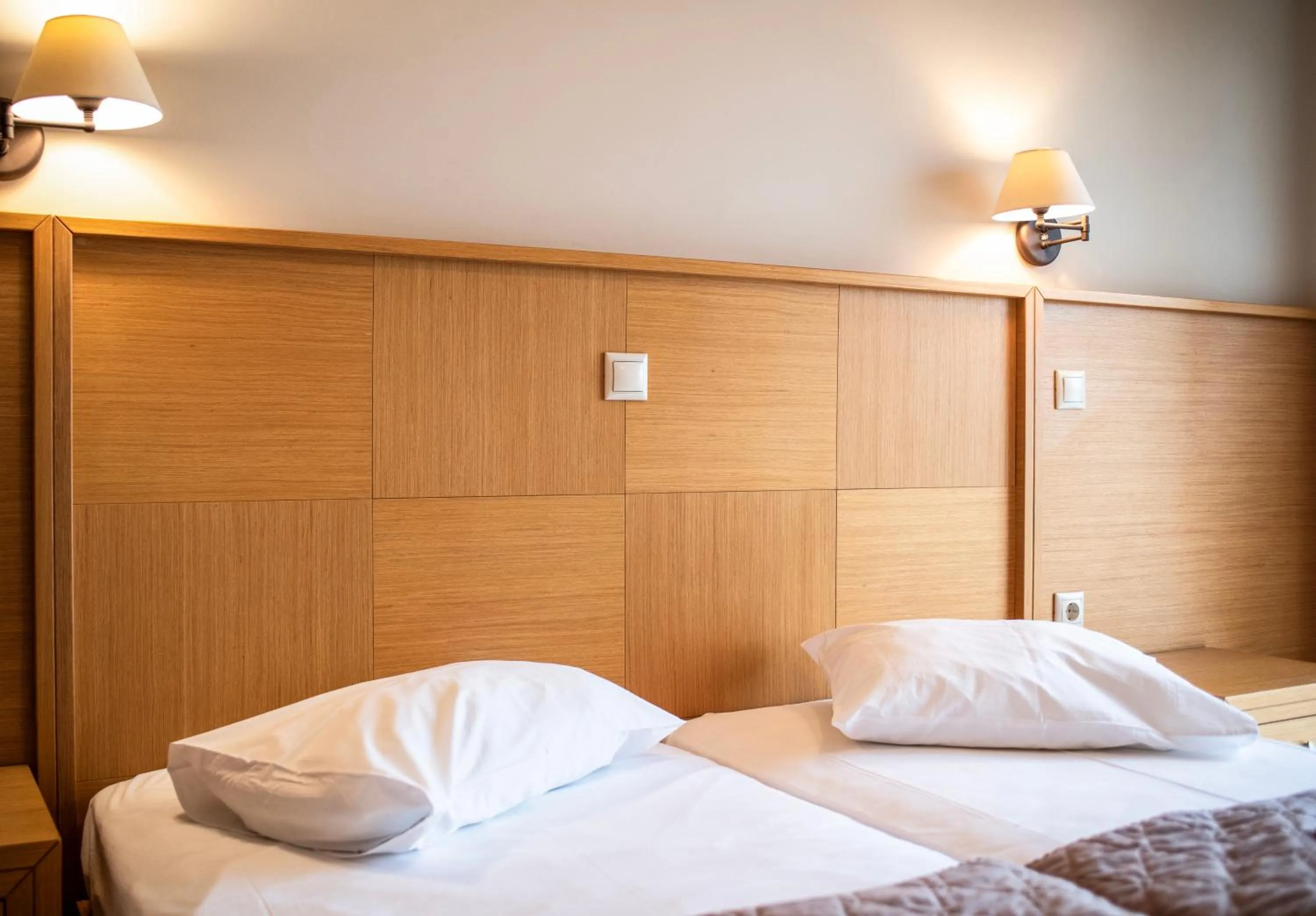 Bed in Evia Hotel & Suites