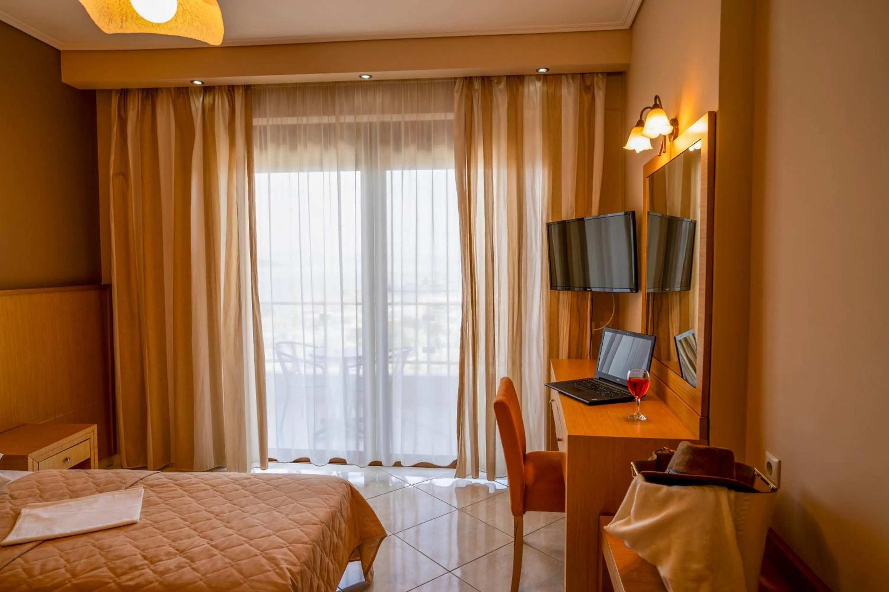 Bed in Evia Hotel & Suites