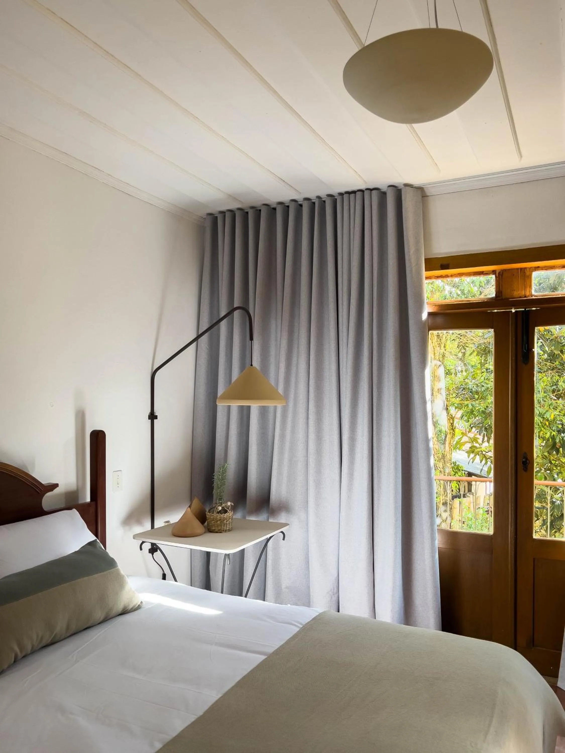 Photo of the whole room, Bed in Pousada Vagalume