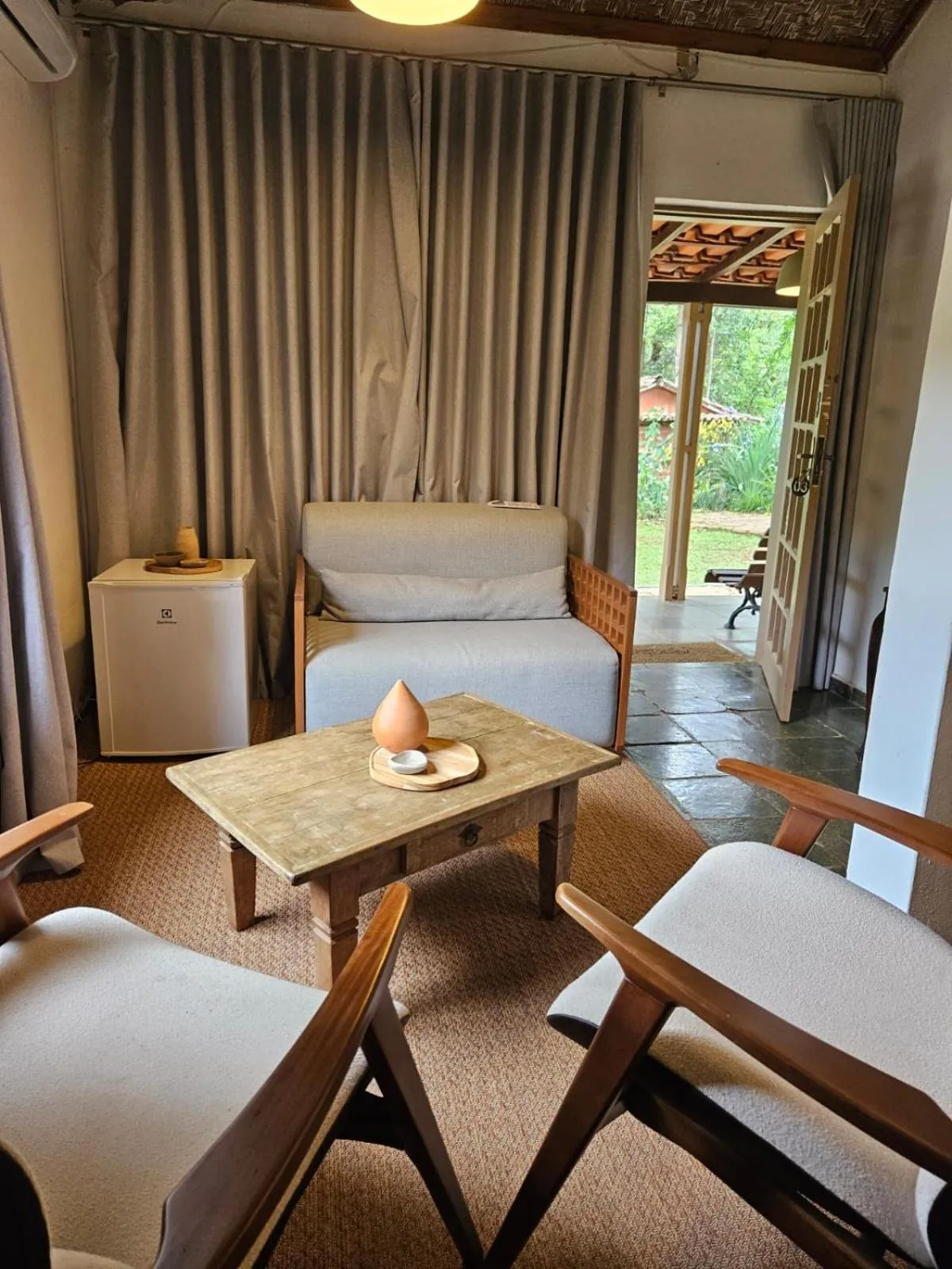 Living room, Bed in Pousada Vagalume