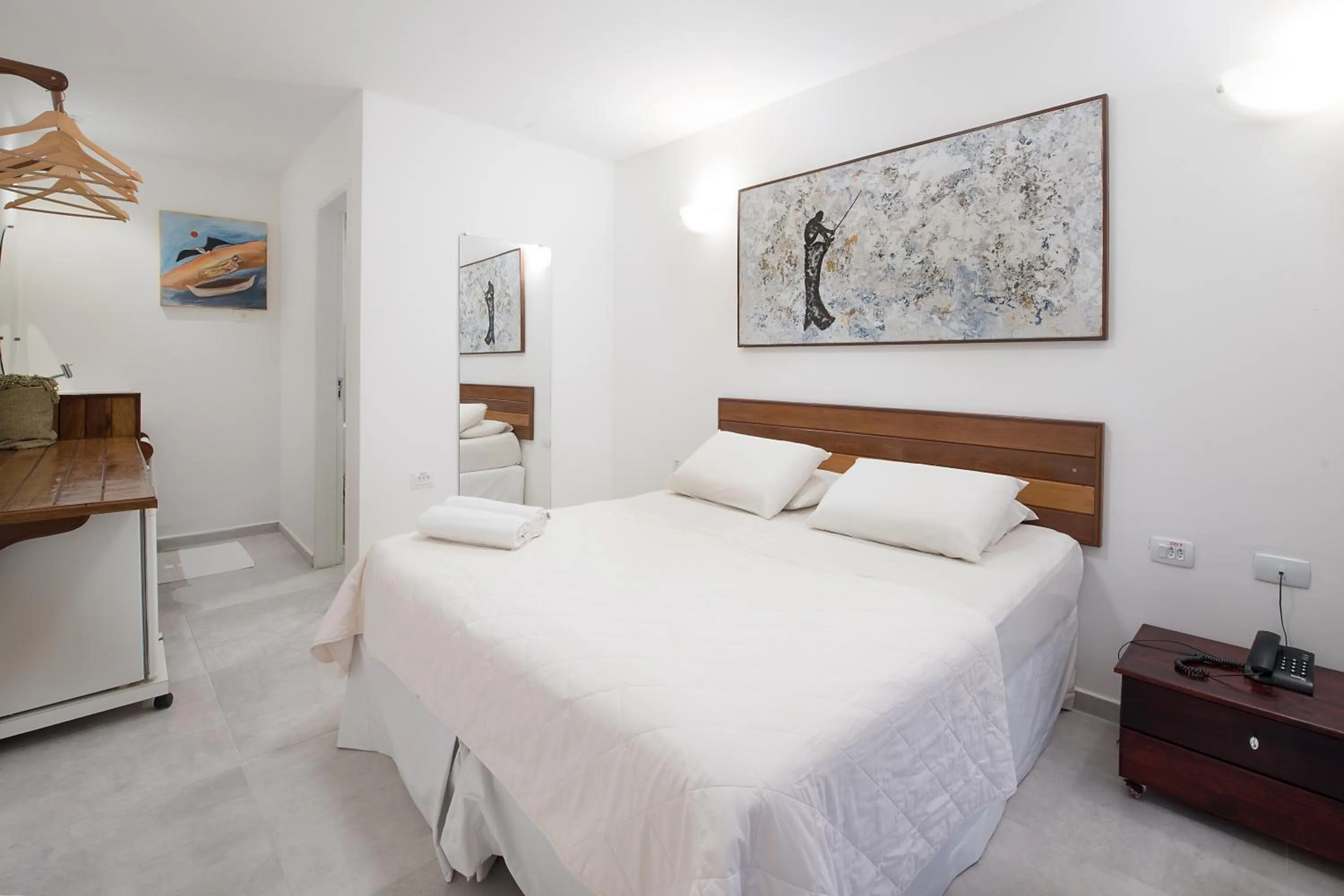 Bed in Pousada Quatro Estações