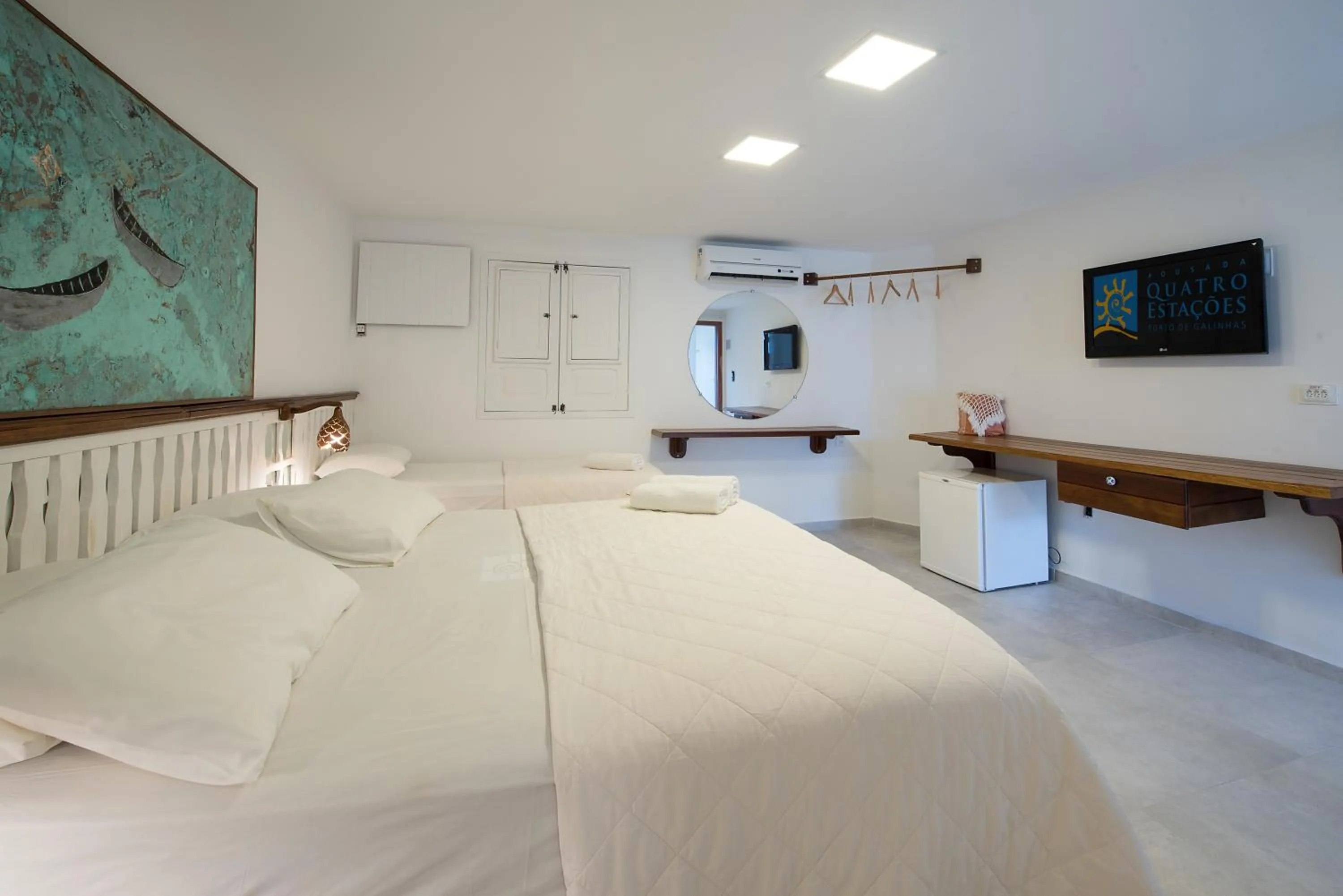 Bed in Pousada Quatro Estações
