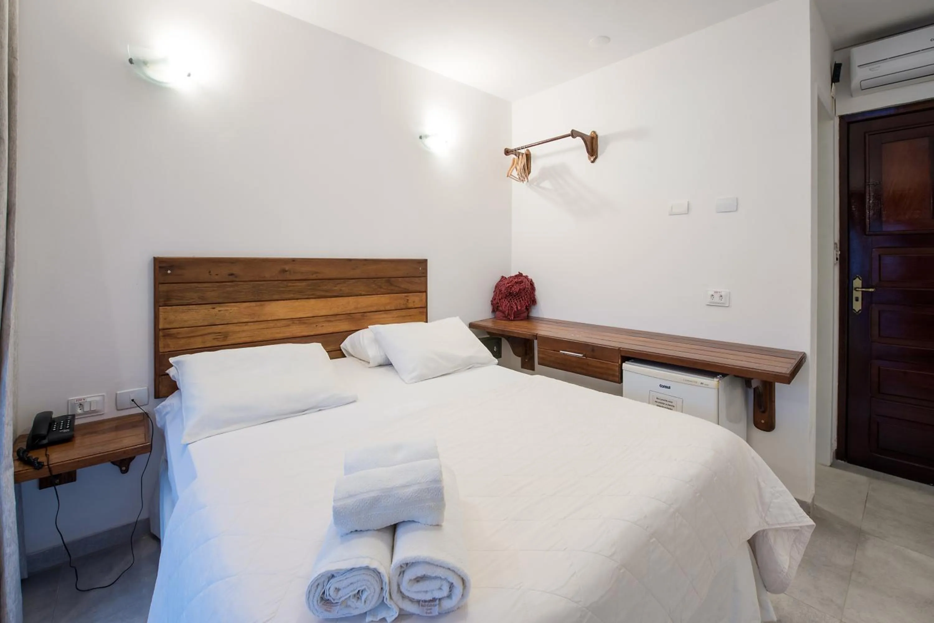 Bed in Pousada Quatro Estações