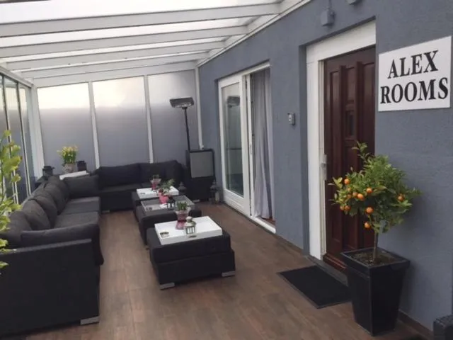 Communal lounge/ TV room in Alex Rooms