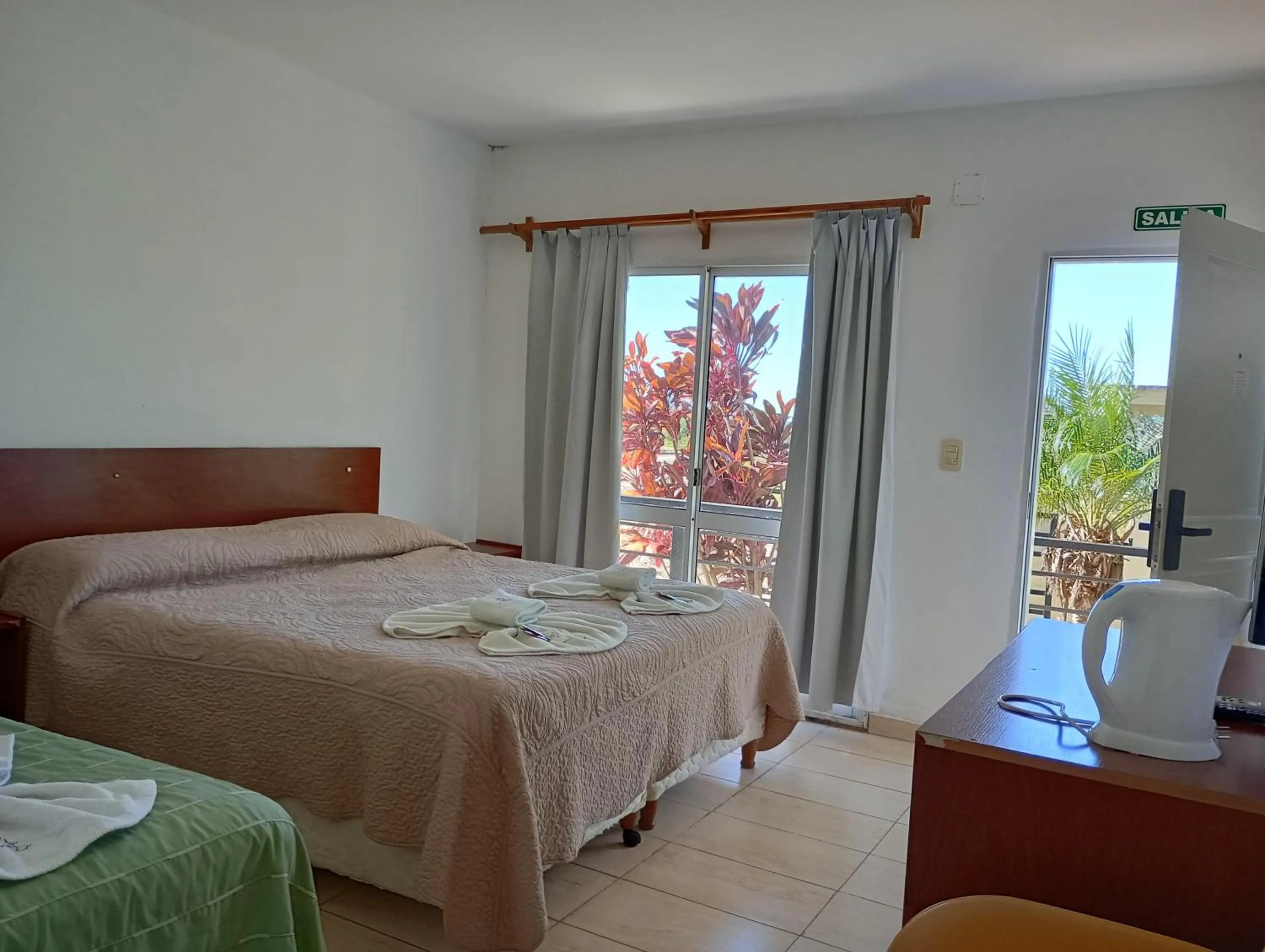 Bed in Brisas del Lago Apart y Hotel