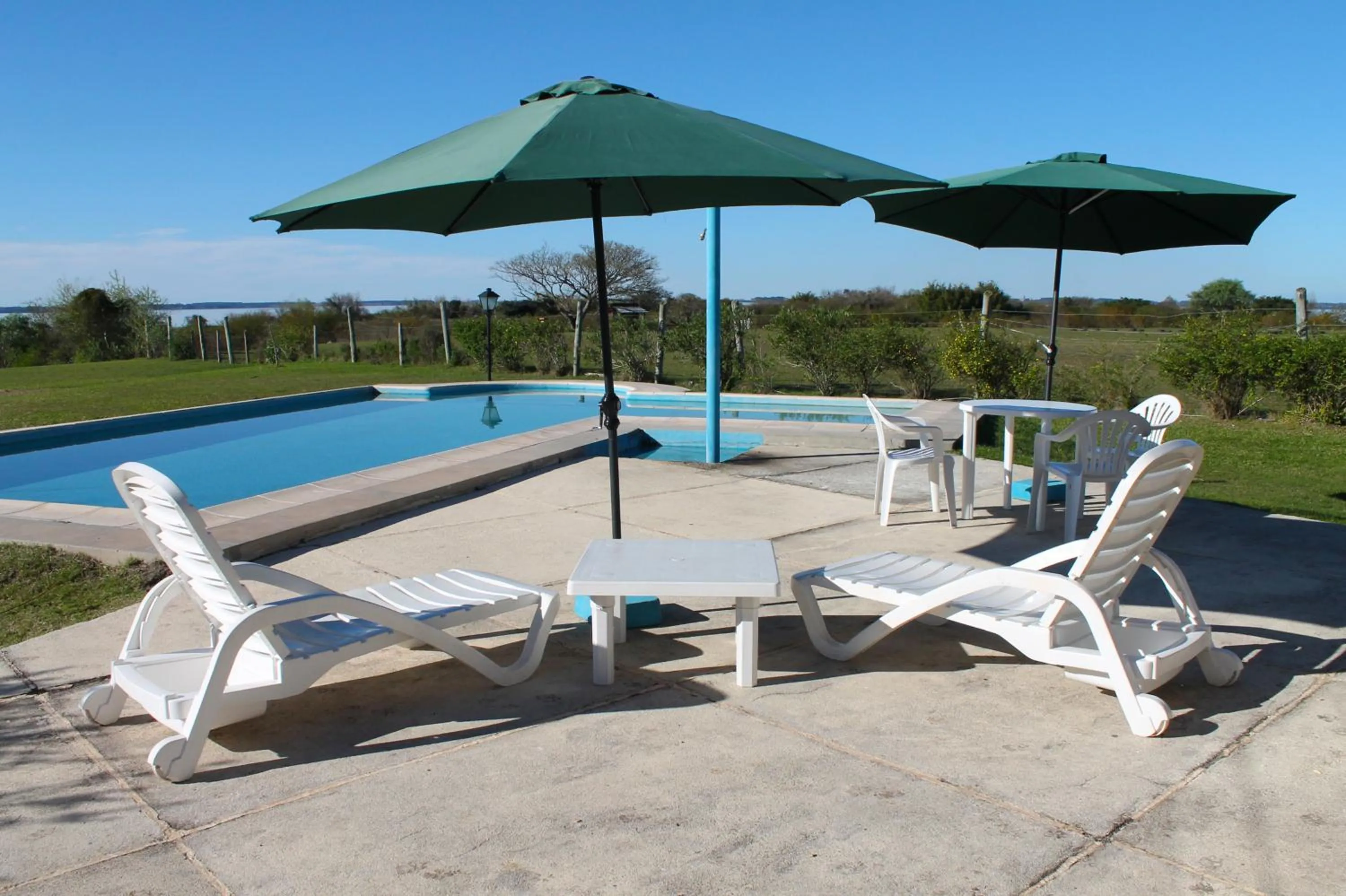 Swimming pool in Brisas del Lago Apart y Hotel