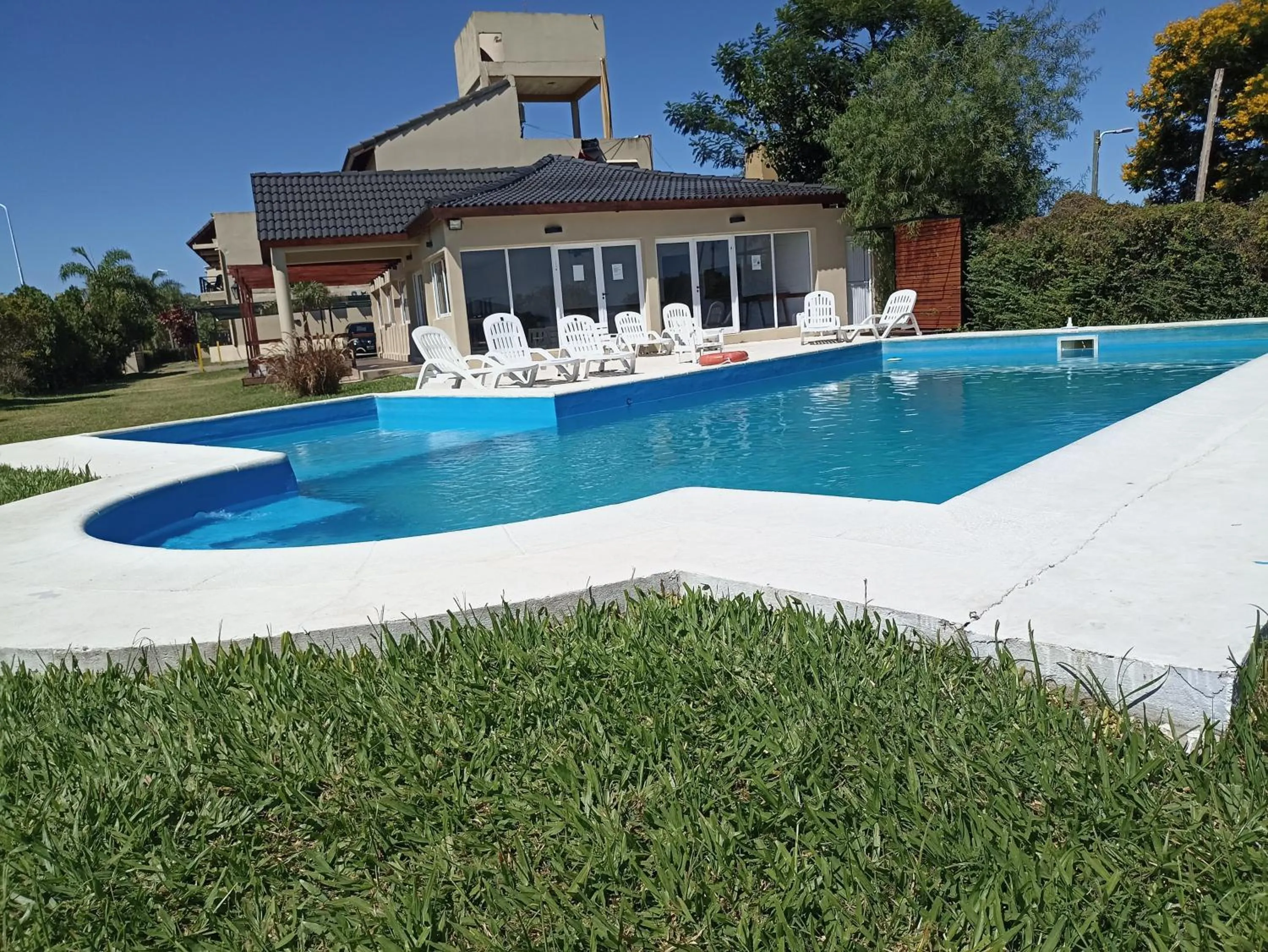 Swimming pool in Brisas del Lago Apart y Hotel